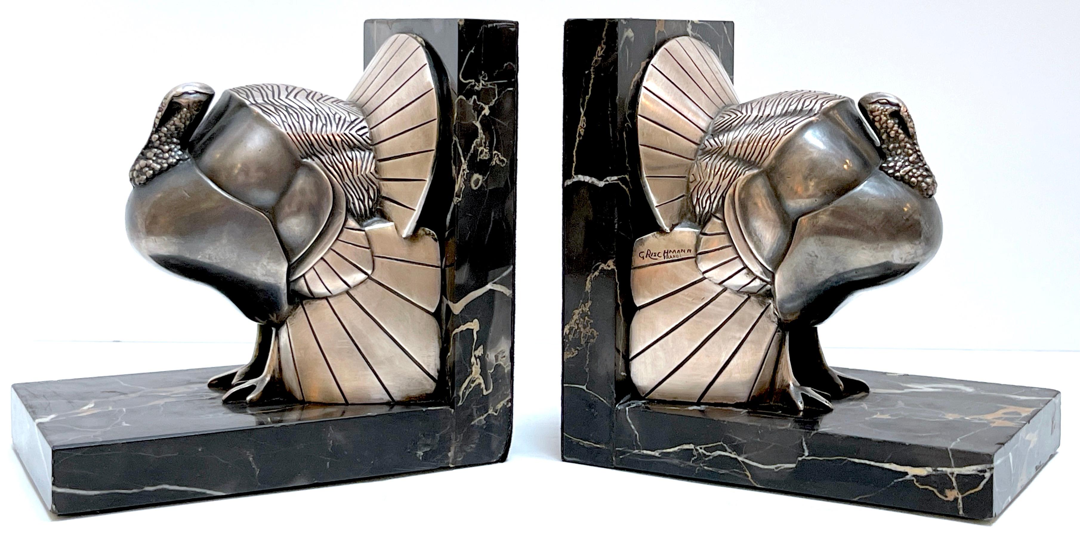Pair Art Deco Silvered-Bronze 'Turkey' Bookends by G. Rischmann France, 1930s
Each one signed in script 'G. Rischmann France'
By Gaston Rischmann (1907-1979)

A unique pair of Art Deco silvered-bronze 'Turkey' bookends crafted by G. Rischmann in