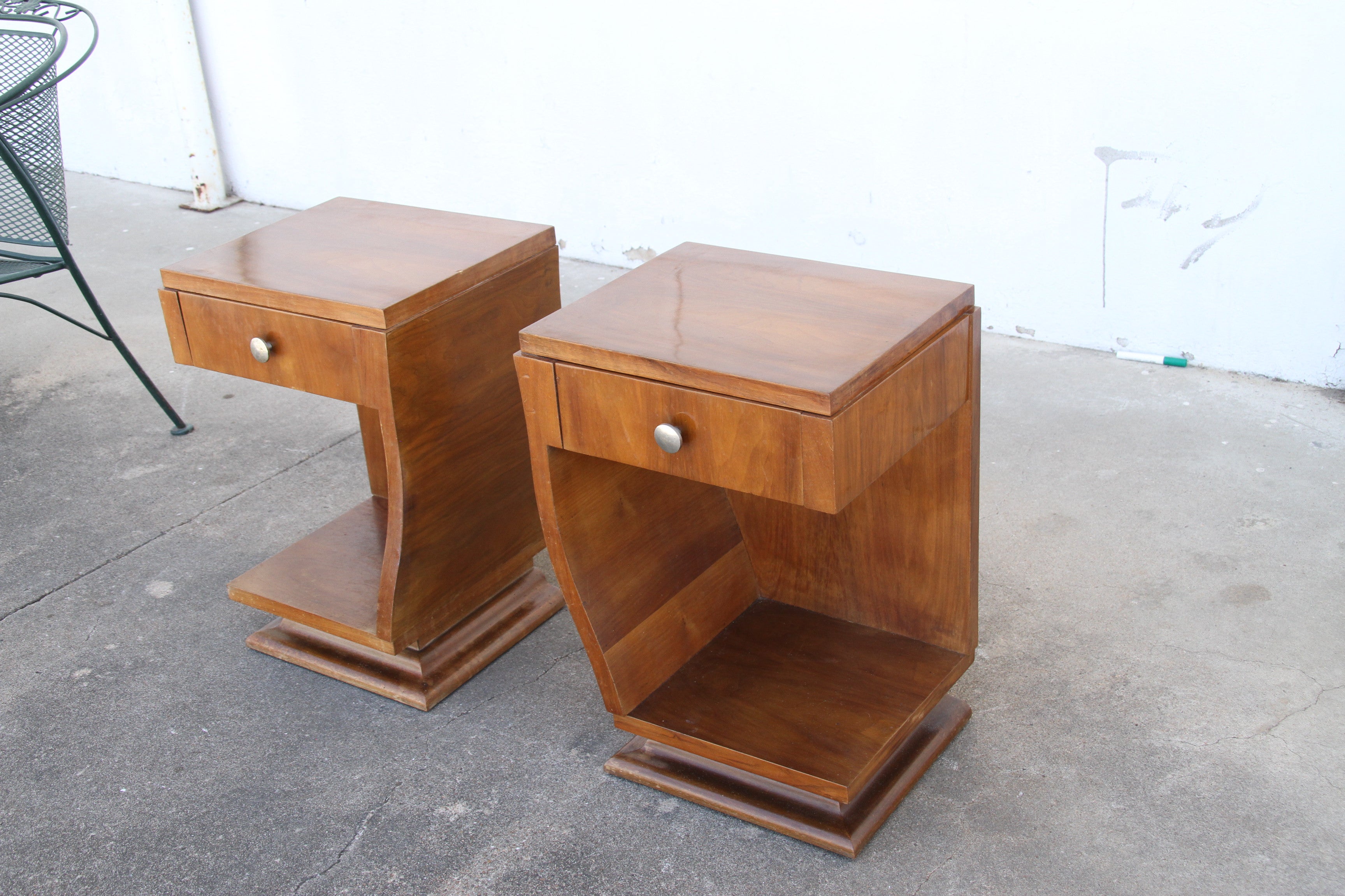 This is a nice pair of Art Deco Style Side Tables or Nightstands. Made of walnut, they're sculpted in the art Deco Style and be the perfect decor for any Art Deco setting 


15