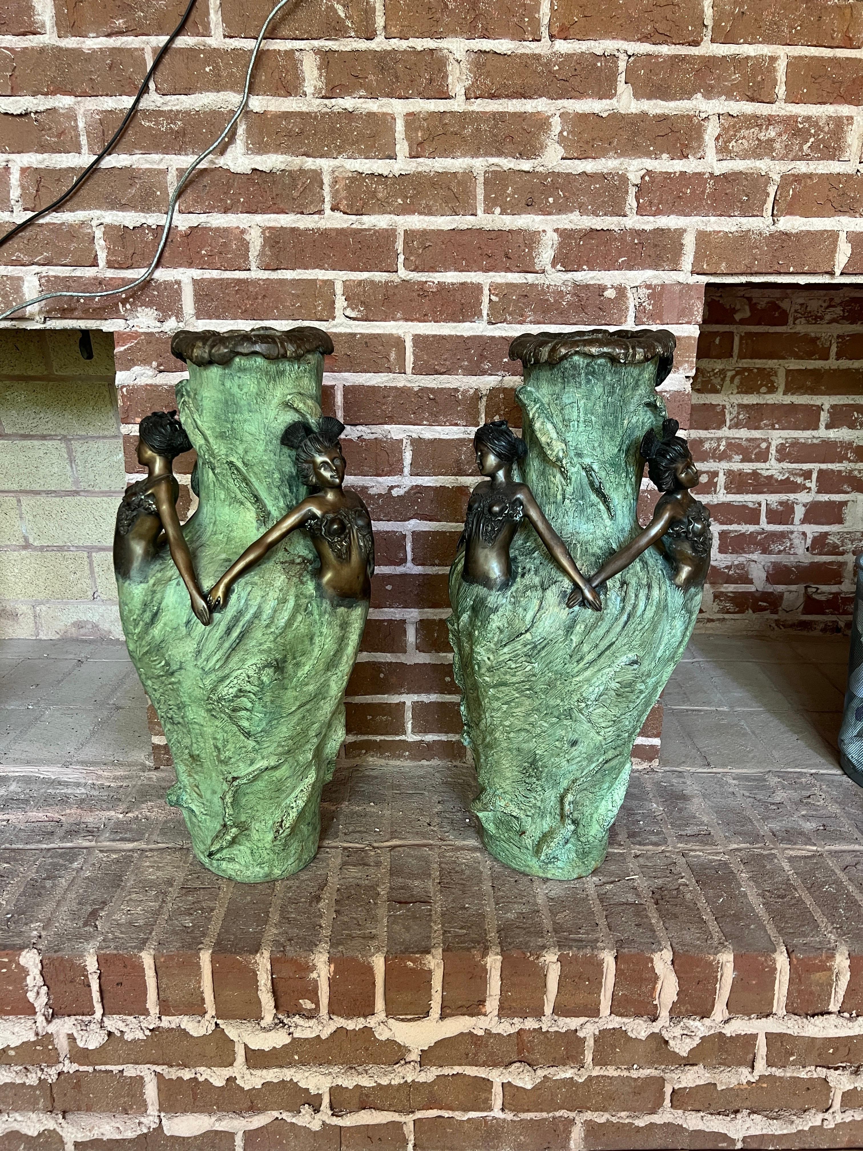 After Louis Chalon (French, 1866-1940).

These vases are large scale floor vases after the famous originals made by Louis Chalon titled 