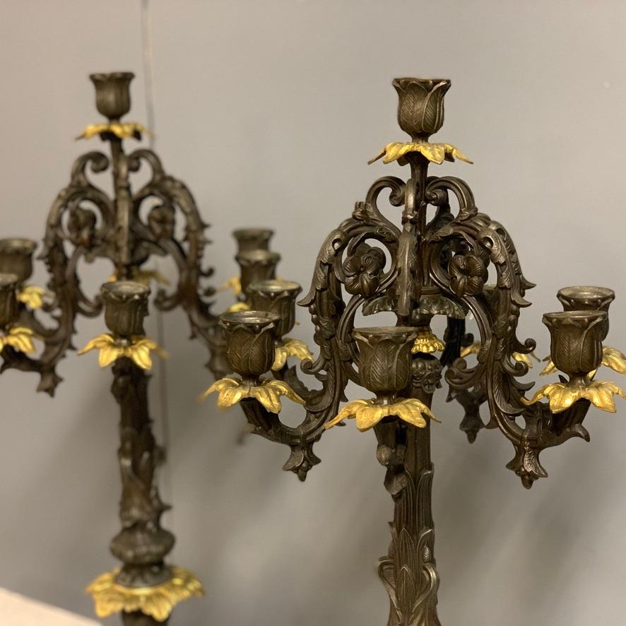 Good decorative pair of French Art Nouveau faux bronze and gilt brass candelabras of a good quality and proportions.
Six branches and the top giving a total of 7 candles to each.
They have both cleaned up beautifully and although 
