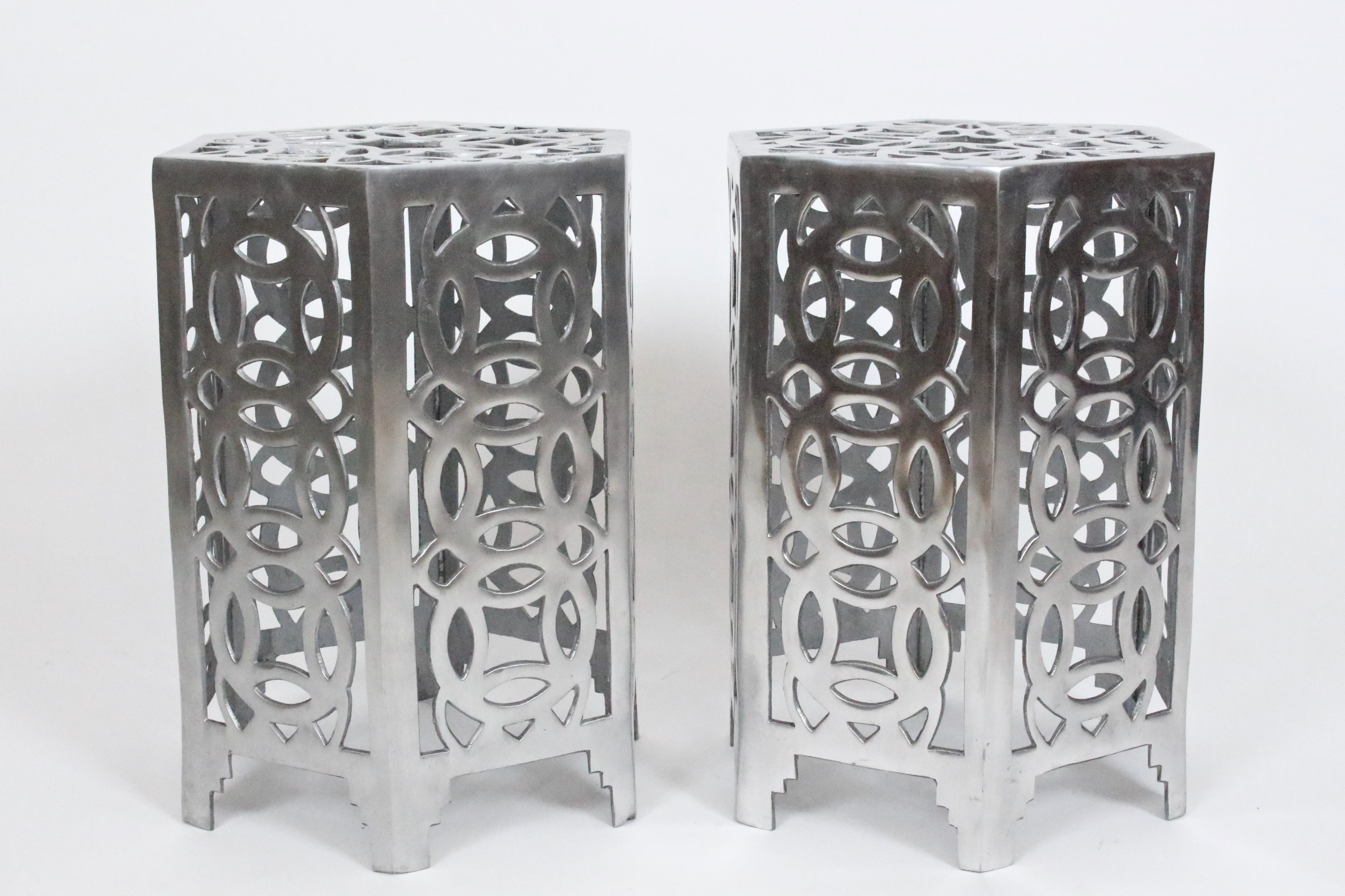 Pair of Arthur Court style Cast Aluminum Chinese Coin end tables, coffee tables, conservatory tables. stools. plant stands. Featuring fine quality, Eastern motif balanced, welded and hand assembled six sided polished cast aluminum with stepped leg
