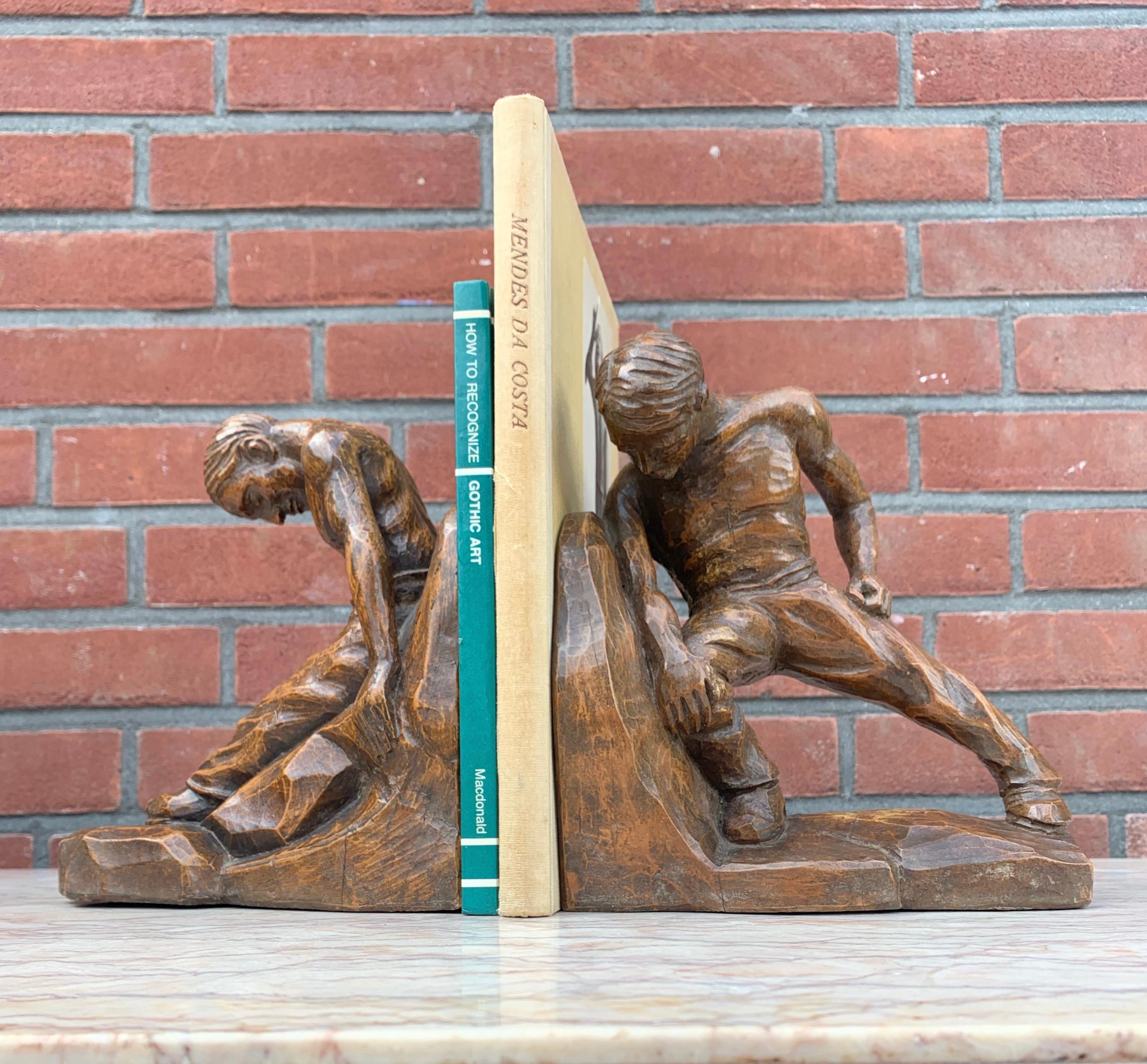 Arts and Crafts Pair of Arts & Crafts Hand Carved Bookends with Strong Semi Nude Muscular Males For Sale