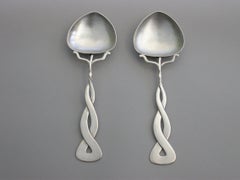 Pair Arts & Crafts Hammered Silver Serving Spoons, Oliver Baker, Liberty & Co.