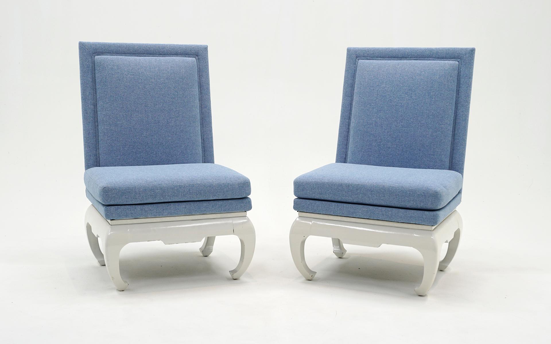 Pair of Asian inspired  armless chairs recently reupholstered in a sky blue fabric wit white lacquered frames.  Very few signs of use.