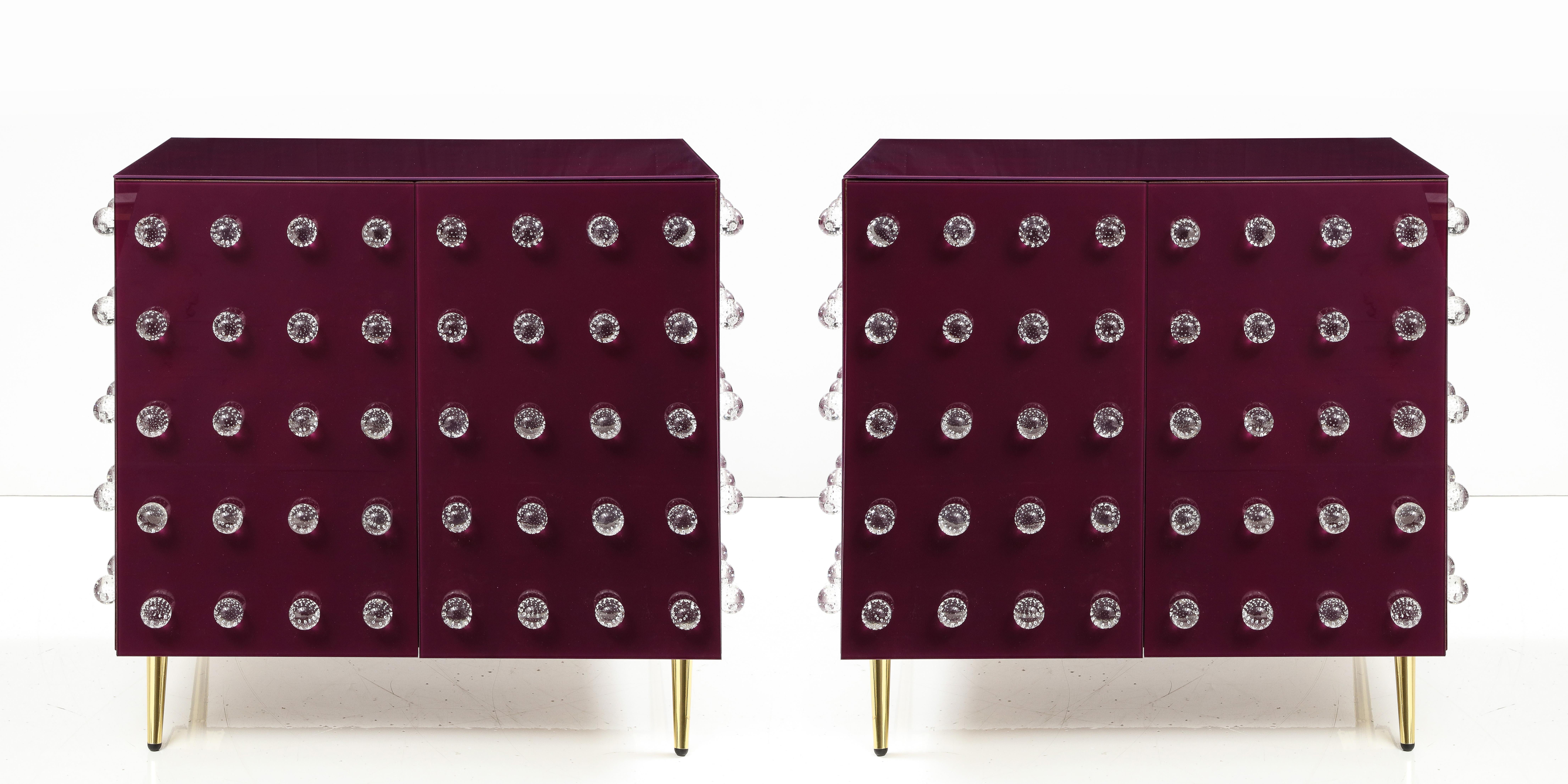 Italian Pair Aubergine Glass with Clear Murano Spheres Cabinets with Brass Legs, Italy For Sale