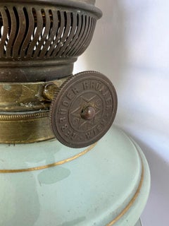 Pair Austrian Porcelain Celadon Glazed Urn-form Lamps with Gilt Bronze Mounts