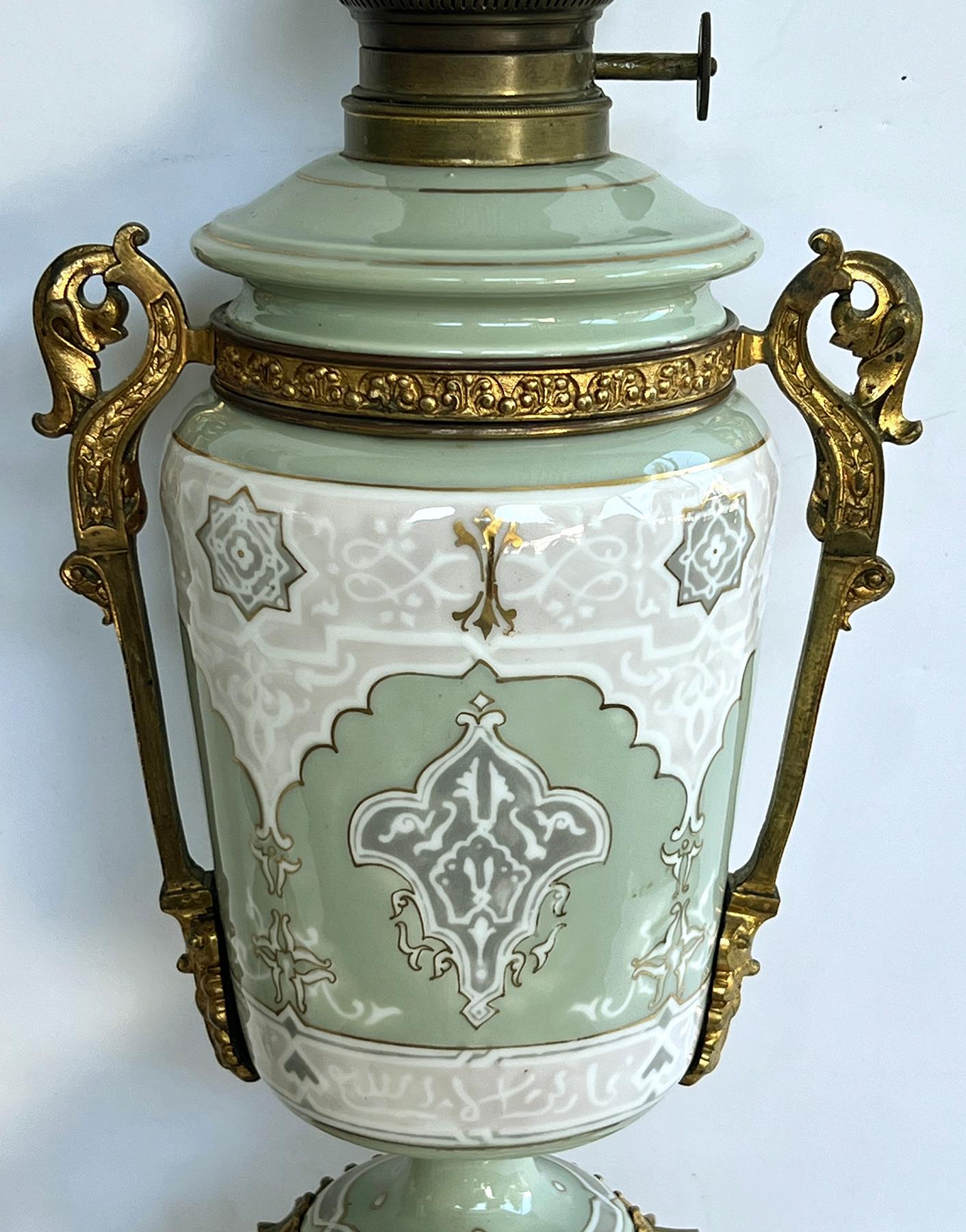Late 19th Century Pair Austrian Porcelain Celadon Glazed Urn-form Lamps with Gilt Bronze Mounts For Sale