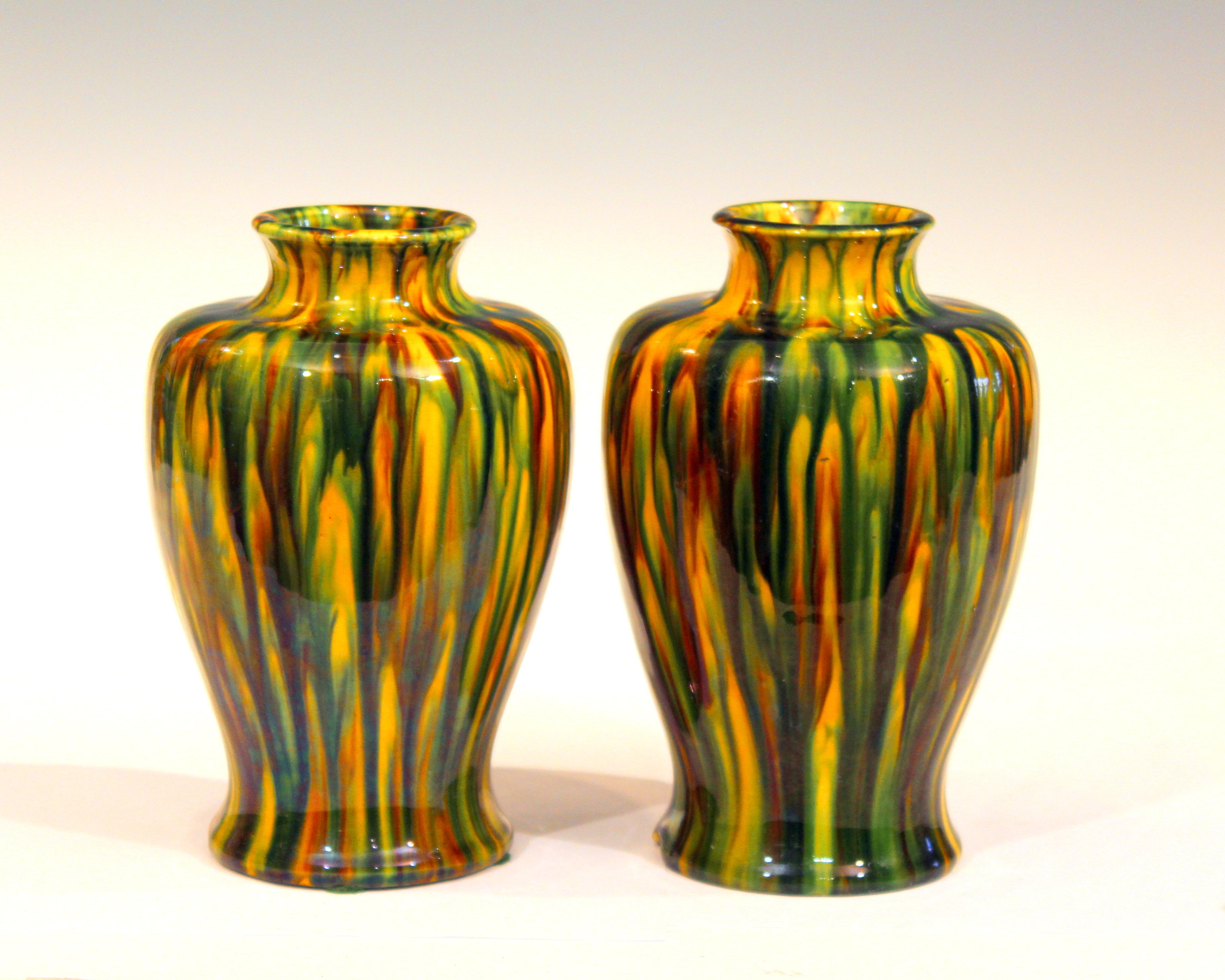Pair of Awaji Pottery garniture vases in striking Art Deco yellow flambe glaze, circa 1930. Impressed marks. Measures: 7