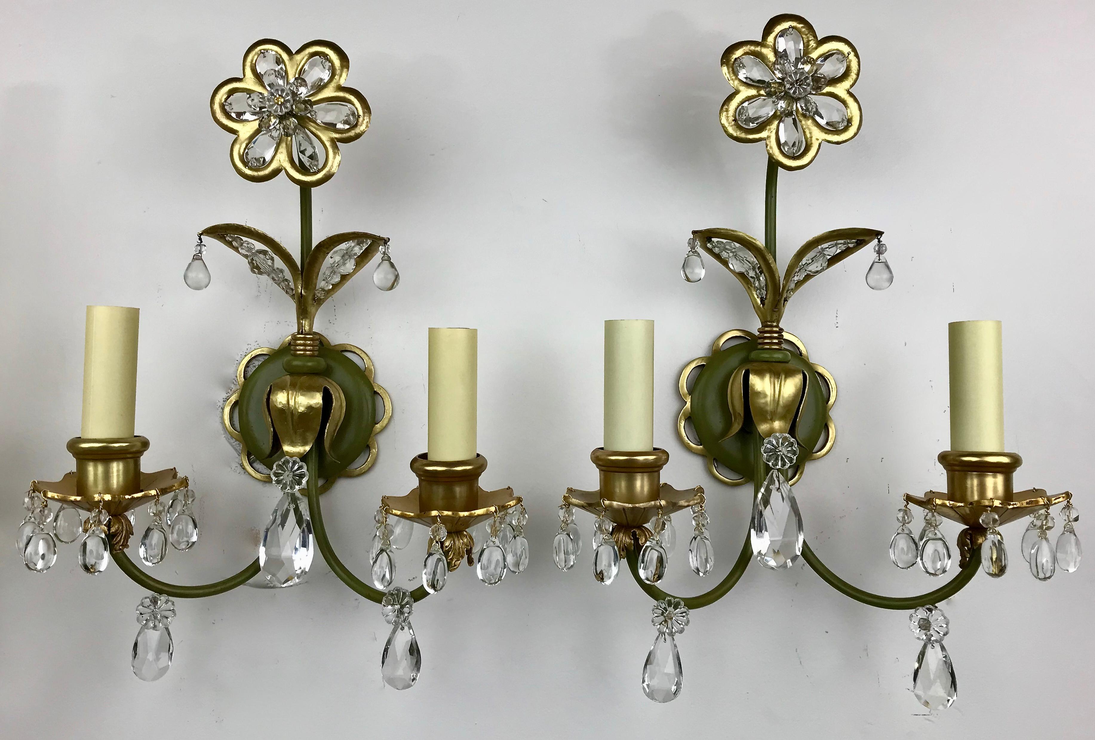 This whimsical pair of hand made sconces are attributed the the renown maker Mason Bagues. They feature crystal enhanced flowers and leaves, and green patinated back plates.