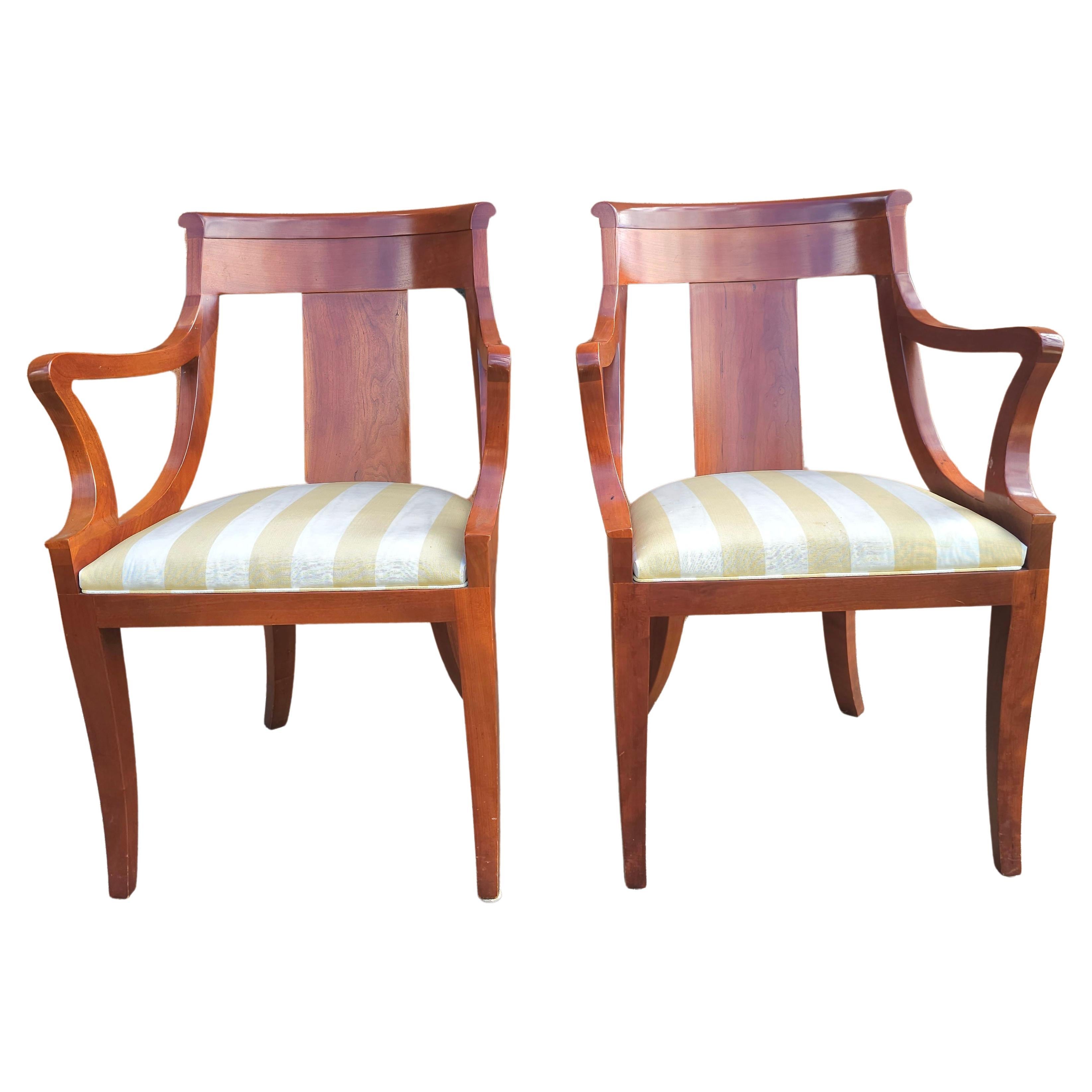 Pair of Baker Furniture Beidermeier Klismos Style Cherry Dining Chairs. A fantastic combination of the traditional Biedemeir and the Klismos styles chairs. This listing is for the pair and there 4 pairs available, 3 pairs of side  chairs and a pair