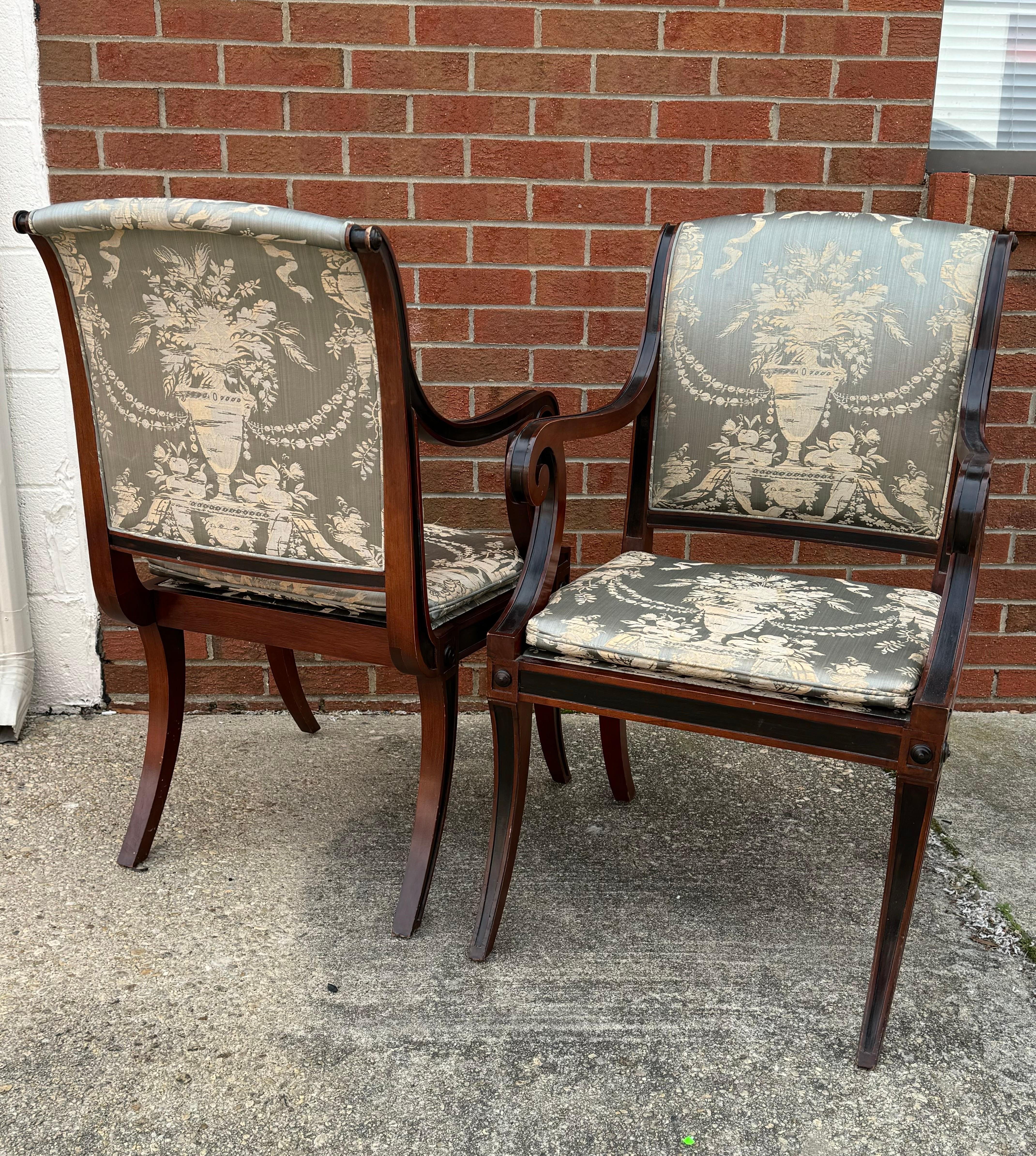Pair of  regency style arm chairs by Baker furniture, circa 1960s. The British regency period was most notably influenced by the exotic Greek, Egyptian and Asian furniture to which visitors at London’s new public museums had begun marveling.