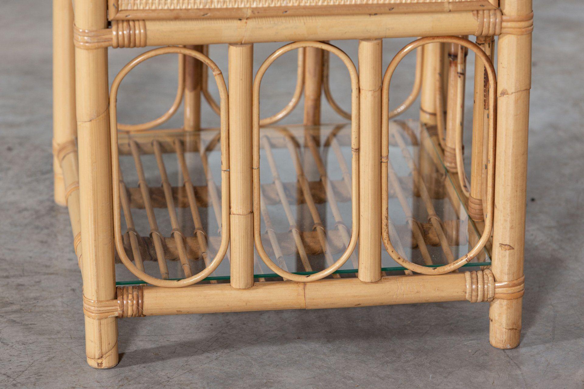 Circa 1970
Pair bamboo & rattan glazed bedside tables.
Price for pair.
sku 1266
Measures: W46 x D46 x H53cm.