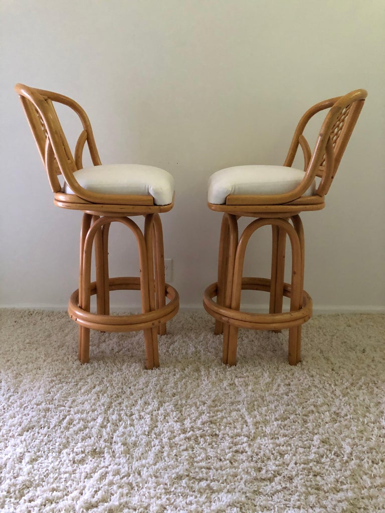 Pair of Bamboo Tall Swivel Bar Stools Vintage Sunbrella Fabric For Sale