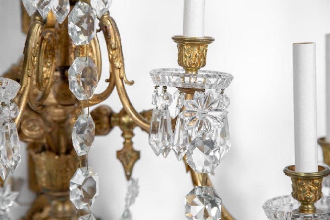 Early 20th Century Pair of Baroque Style Bronze and Crystal Wall Sconces For Sale