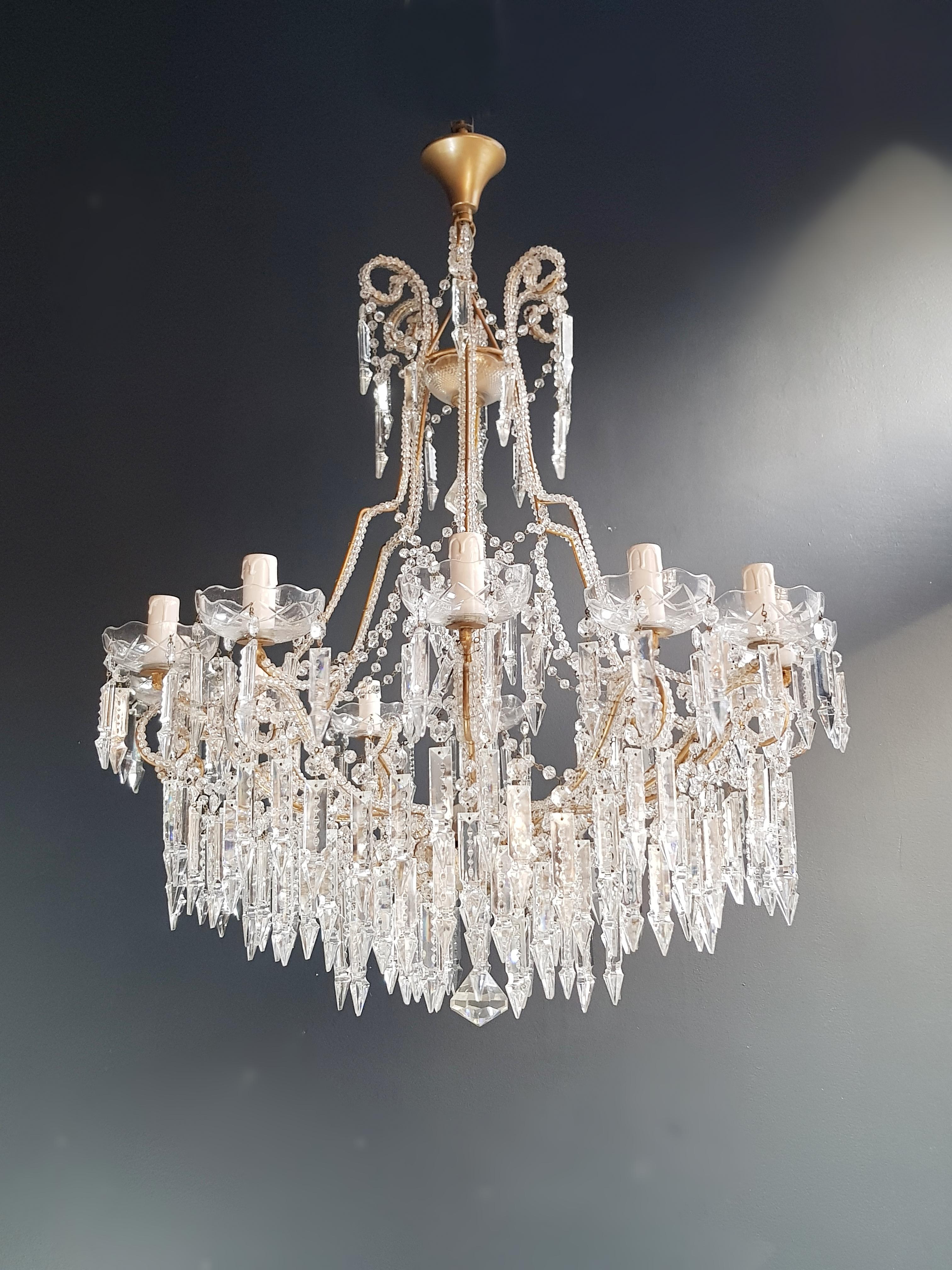 **Pair of Art Nouveau Chandelier Ceiling Lamps - A Symphony of Brass and Crystal**

Presenting a captivating duo of chandelier ceiling lamps, each a masterpiece of Art Nouveau elegance. The brass frame is adorned with beaded chains that encircle it