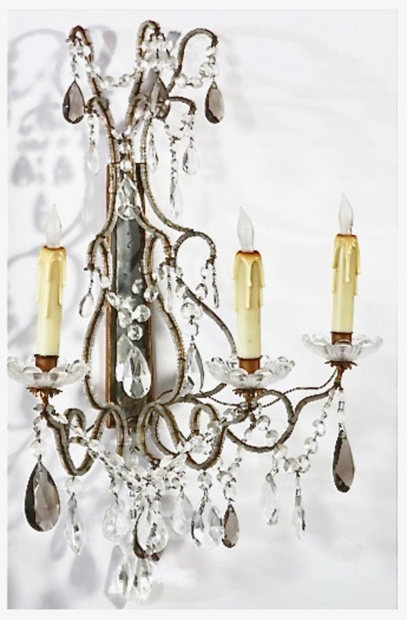 This is a very elegant pair of beaded and crystal pendant Maria Theresa wall sconces that date to the mid-20th century. These sconces are elegant and in very good original condition--they are ready for installation in their new home.