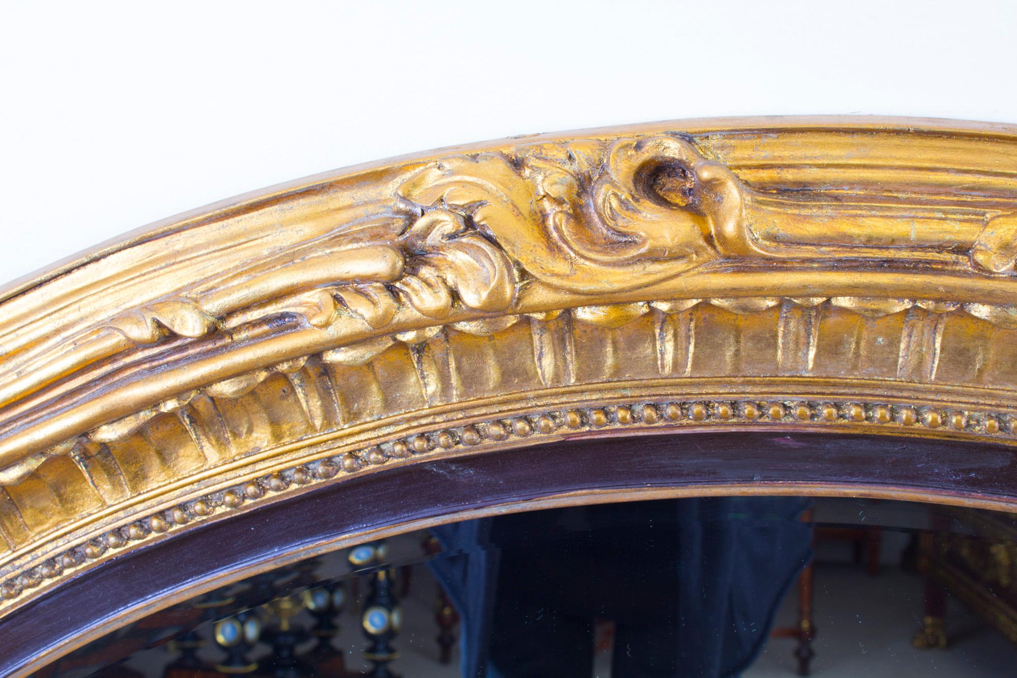 Late 20th Century Pair of Beautiful Large Rococo Style Gilded Oval Mirrors