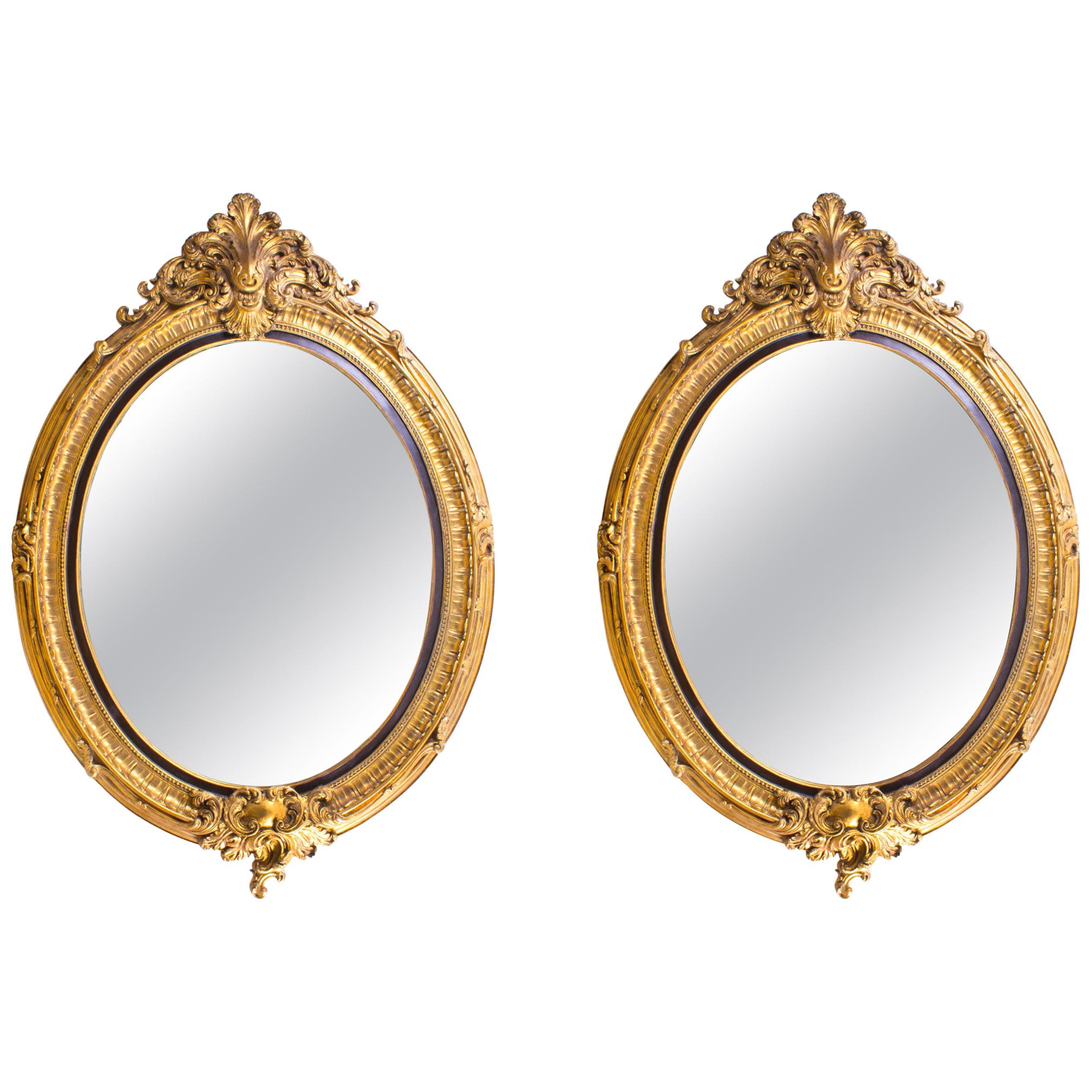 Pair of Beautiful Large Rococo Style Gilded Oval Mirrors