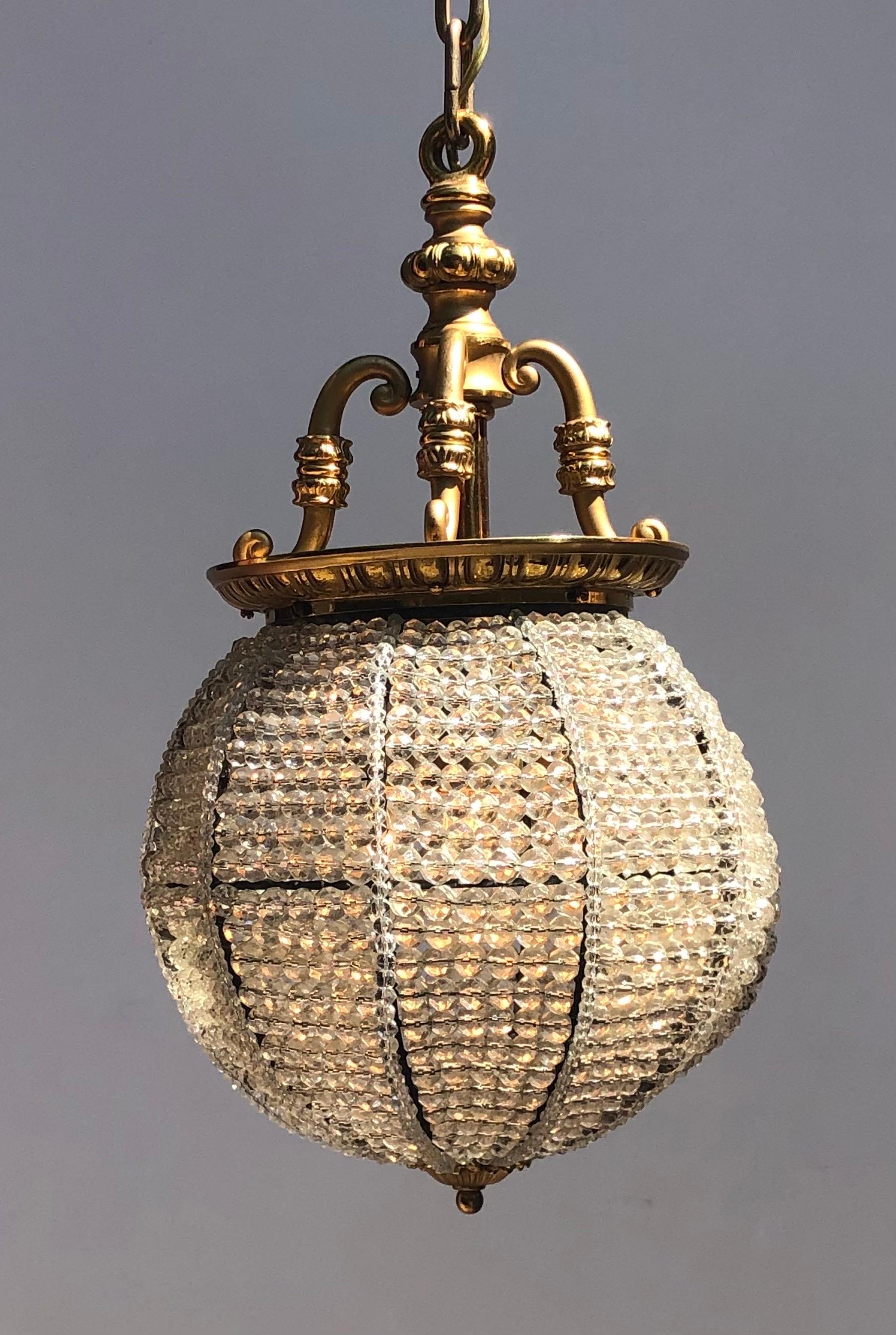Pair Belle Epoque Bronze & Beaded Crystal Sphere Chandeliers / Pendants In Good Condition For Sale In Charleston, SC