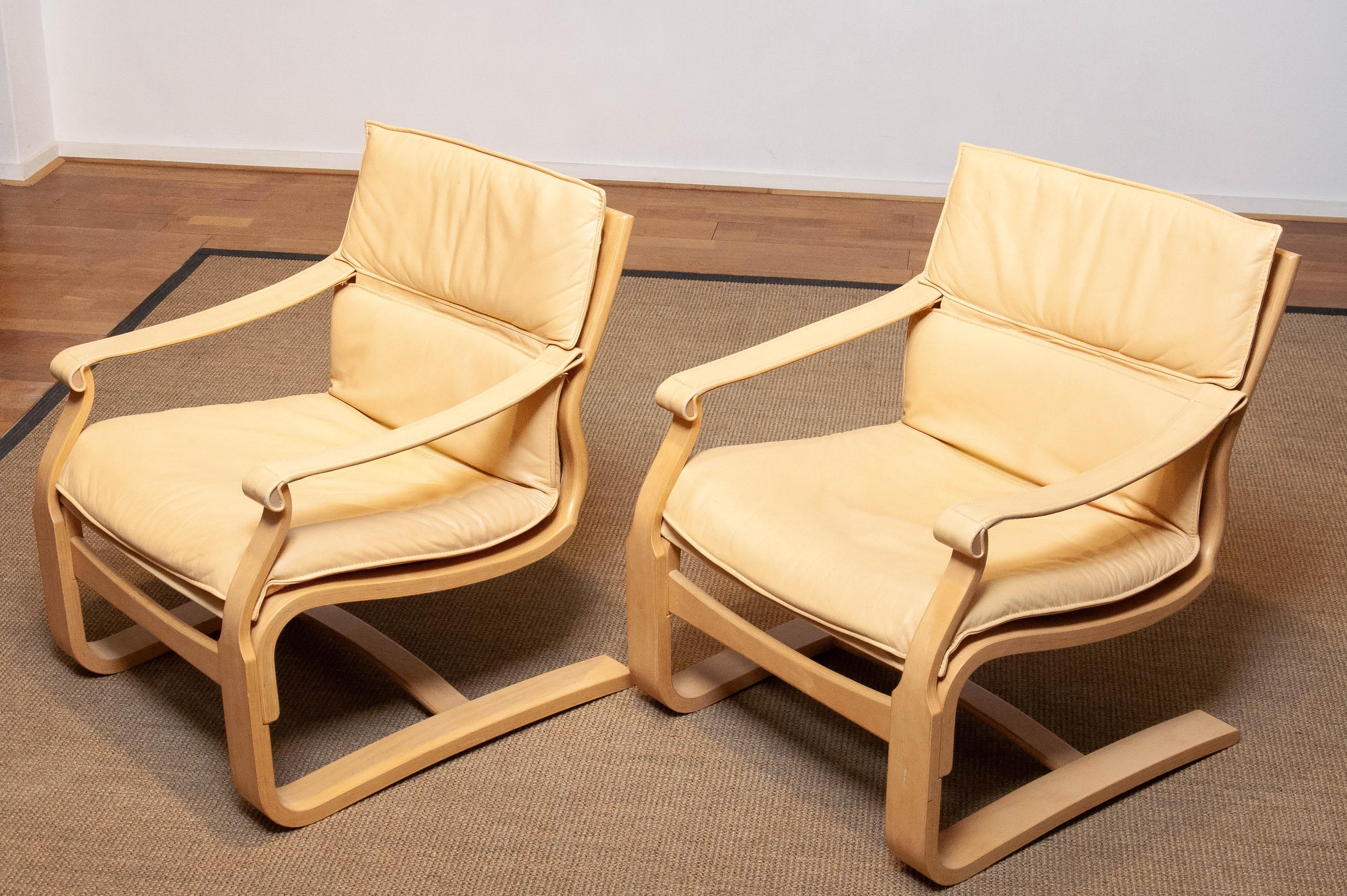 Swedish Pair Bentwood with Beige / Creme Leather Lounge Chairs by Ake Fribytter for Nelo For Sale