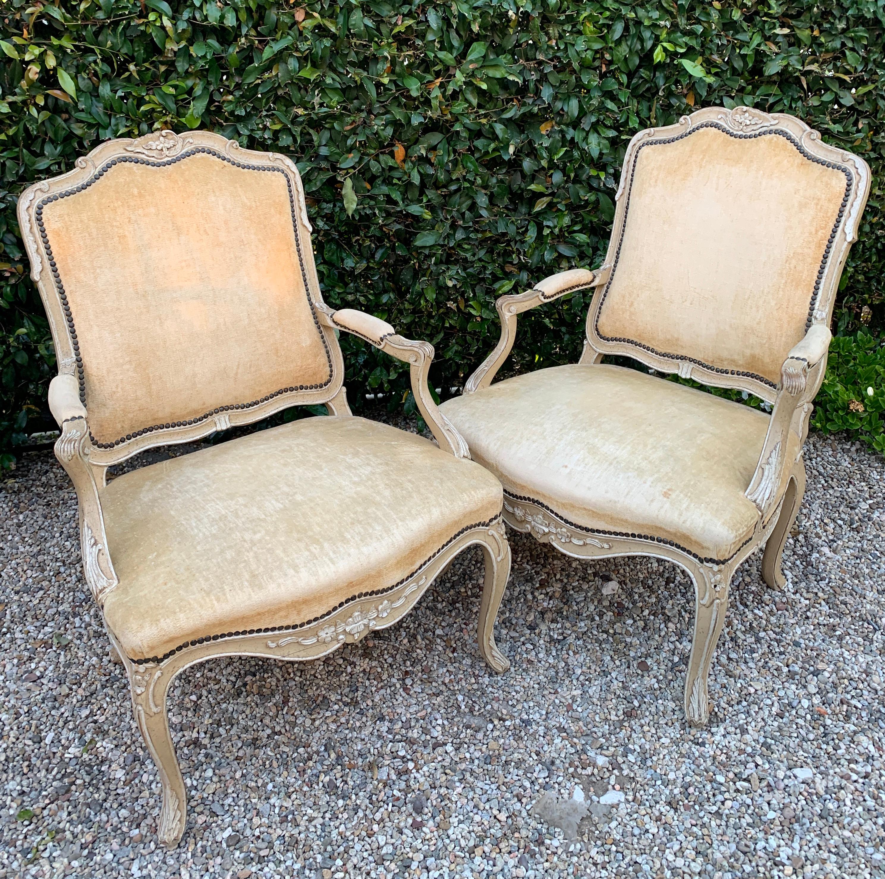 Pair of bergere Fauteuil chairs in the style of Louis XV - A lovely pair with great age and dimension - cream velvet with bone finish.