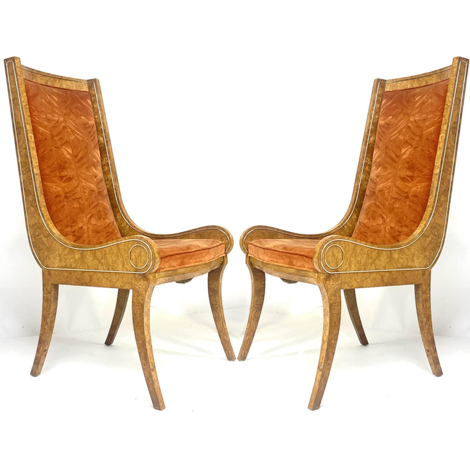 Very Rare and stunning pair of sculptural curved leg dining / side chairs by Mastercraft. These chairs are solid and heavy yet have a light and delicate design. The gondola style chairs with a sort of Klismos style leg could be used as end chairs on