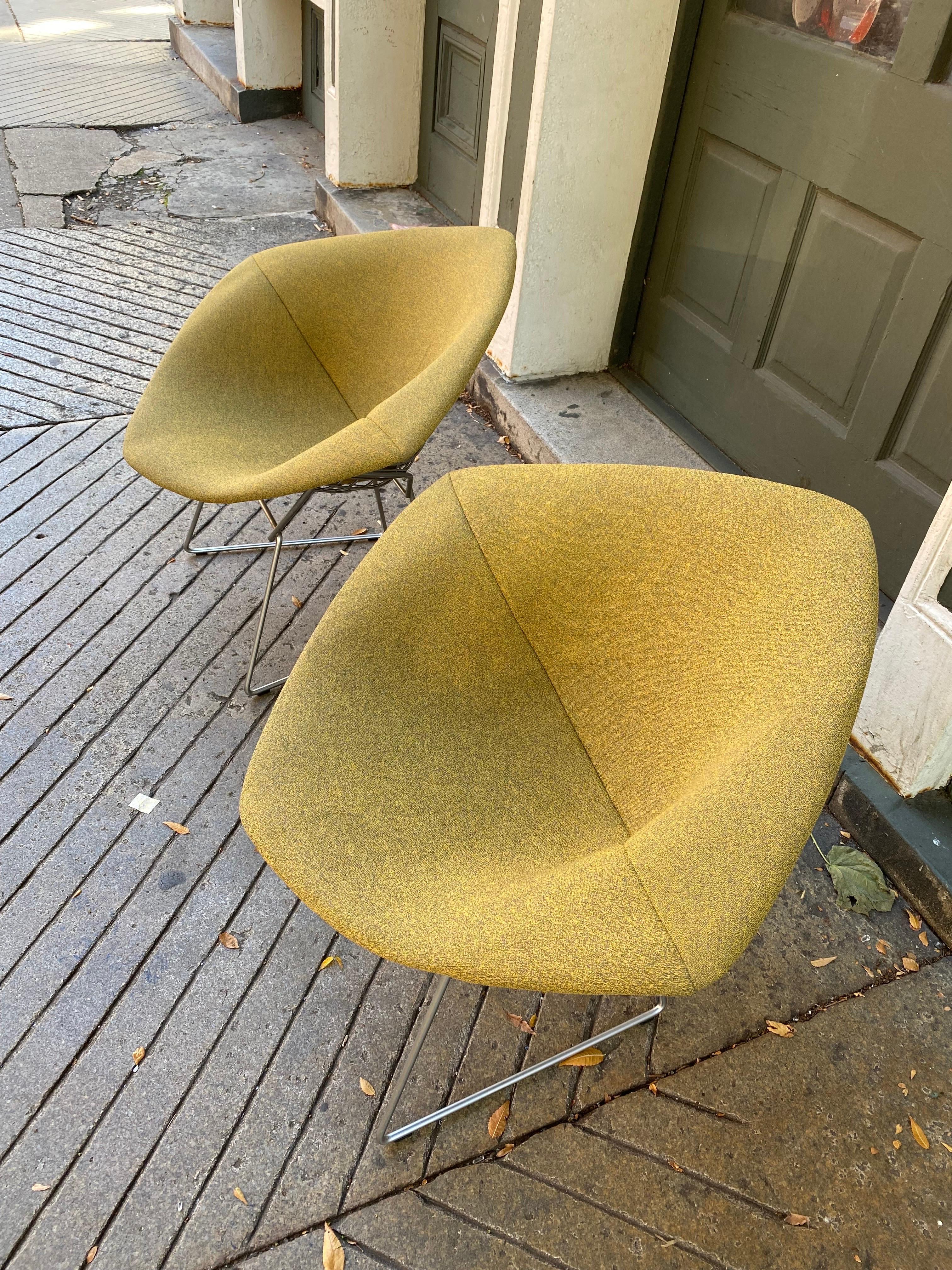 Pair of Bertoia for Knoll small diamond chairs. Newly cleaned covers look very good! Chairs are in a Satin Chrome finish. In very good shape, they have been in storage for a few years, originally from a designer showroom in Philadelphia. Color is a