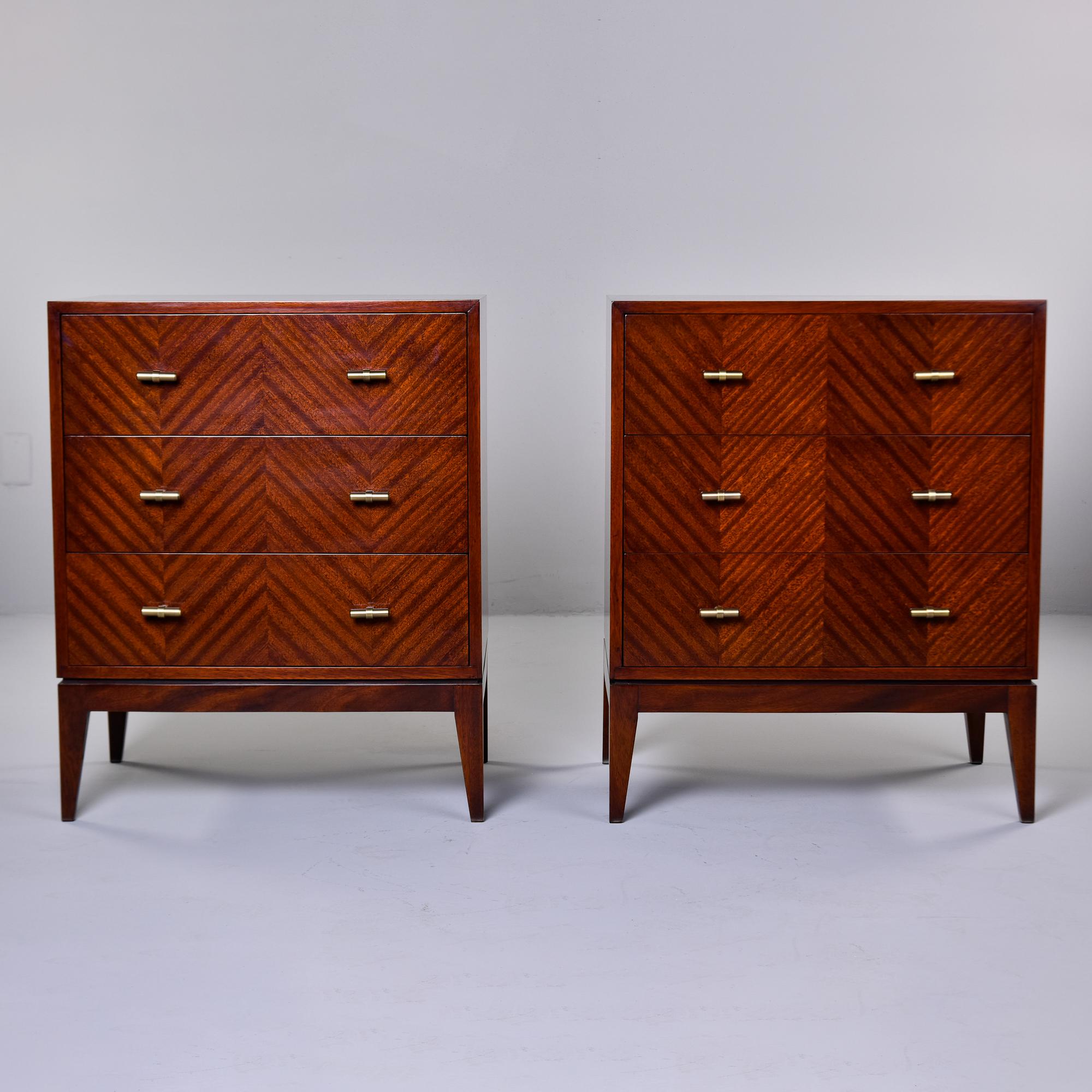 New and custom made for us in England, this pair of three drawer chests is made of walnut. Veneer fronts have subtle herringbone pattern. Three functional drawers. Perfect to use for bedside or side tables. Sold and priced as a pair. 
