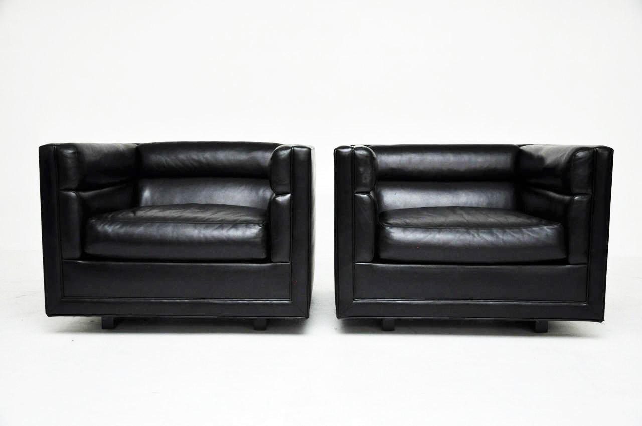 Pair of over sized black upholstered 