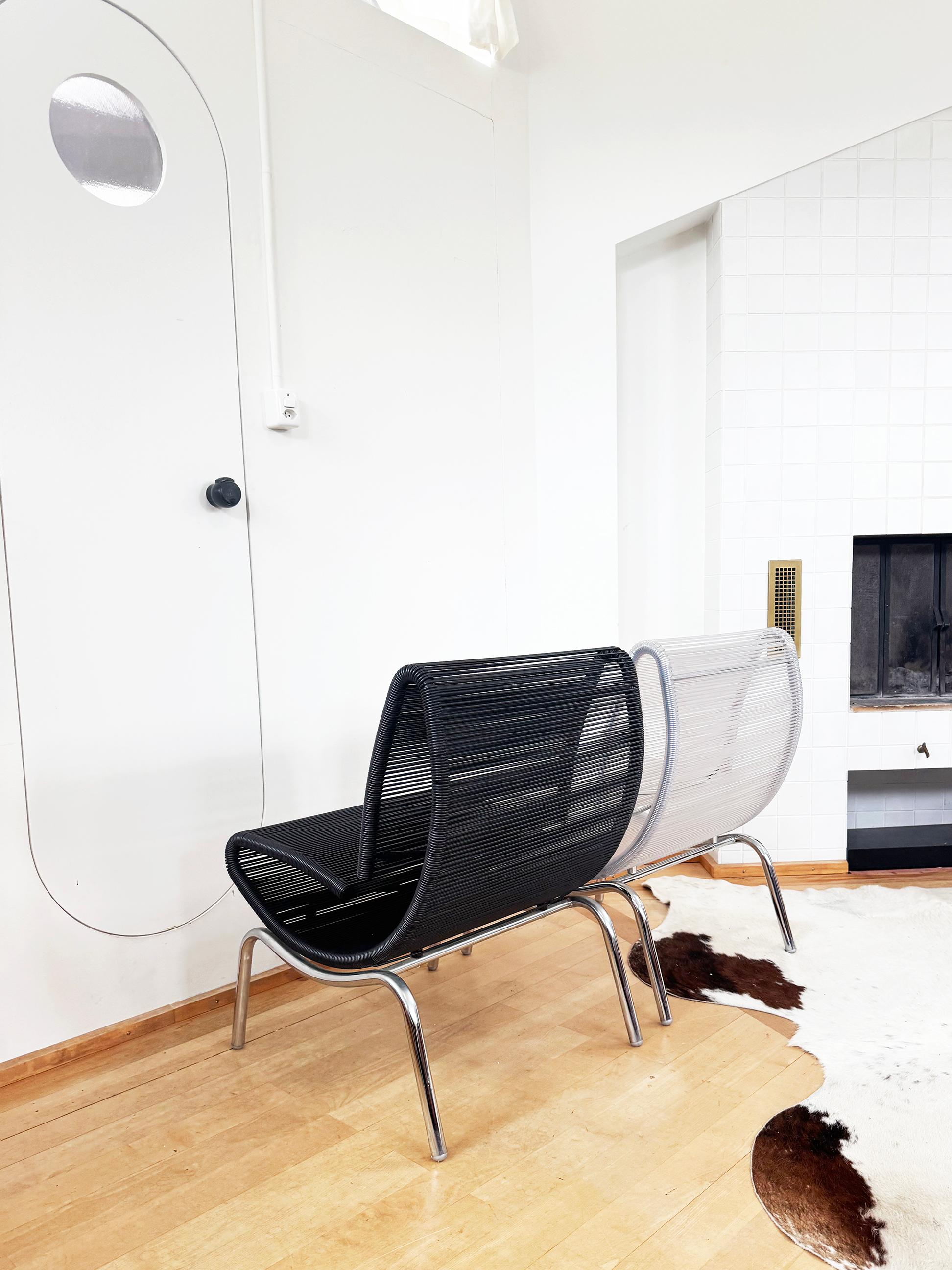 PAIR Black + Clear Chair Model 