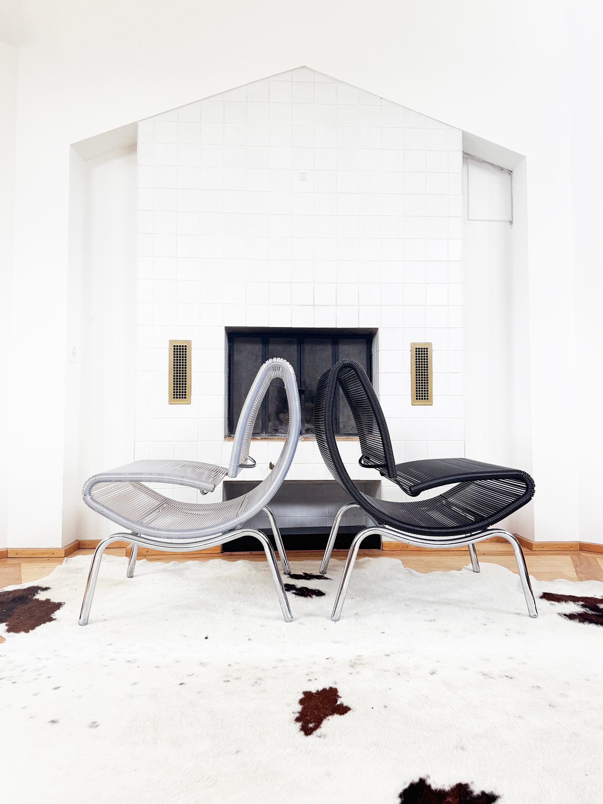 PAIR Black + Clear Chair Model 