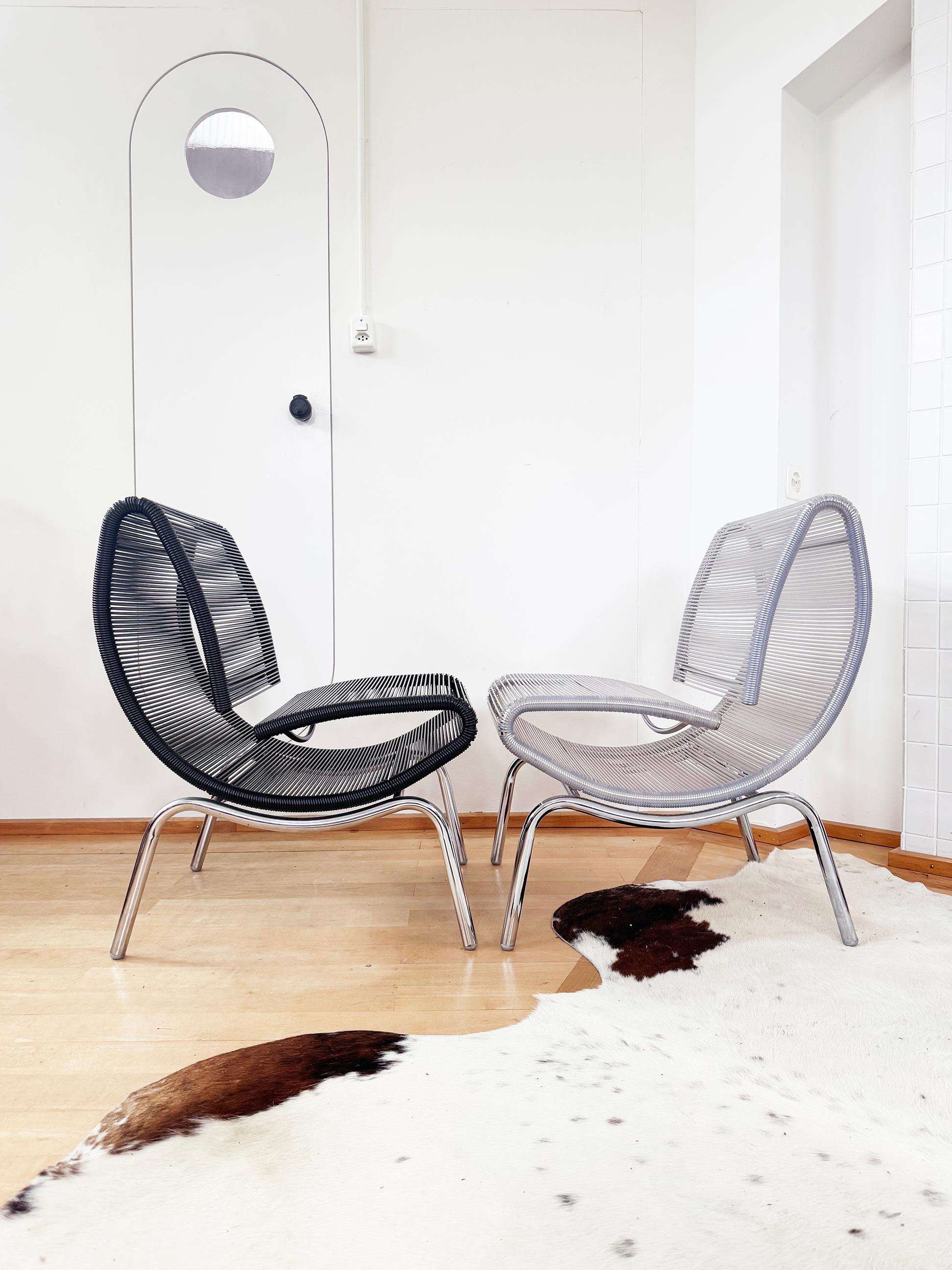 PAIR Black + Clear Chair Model 