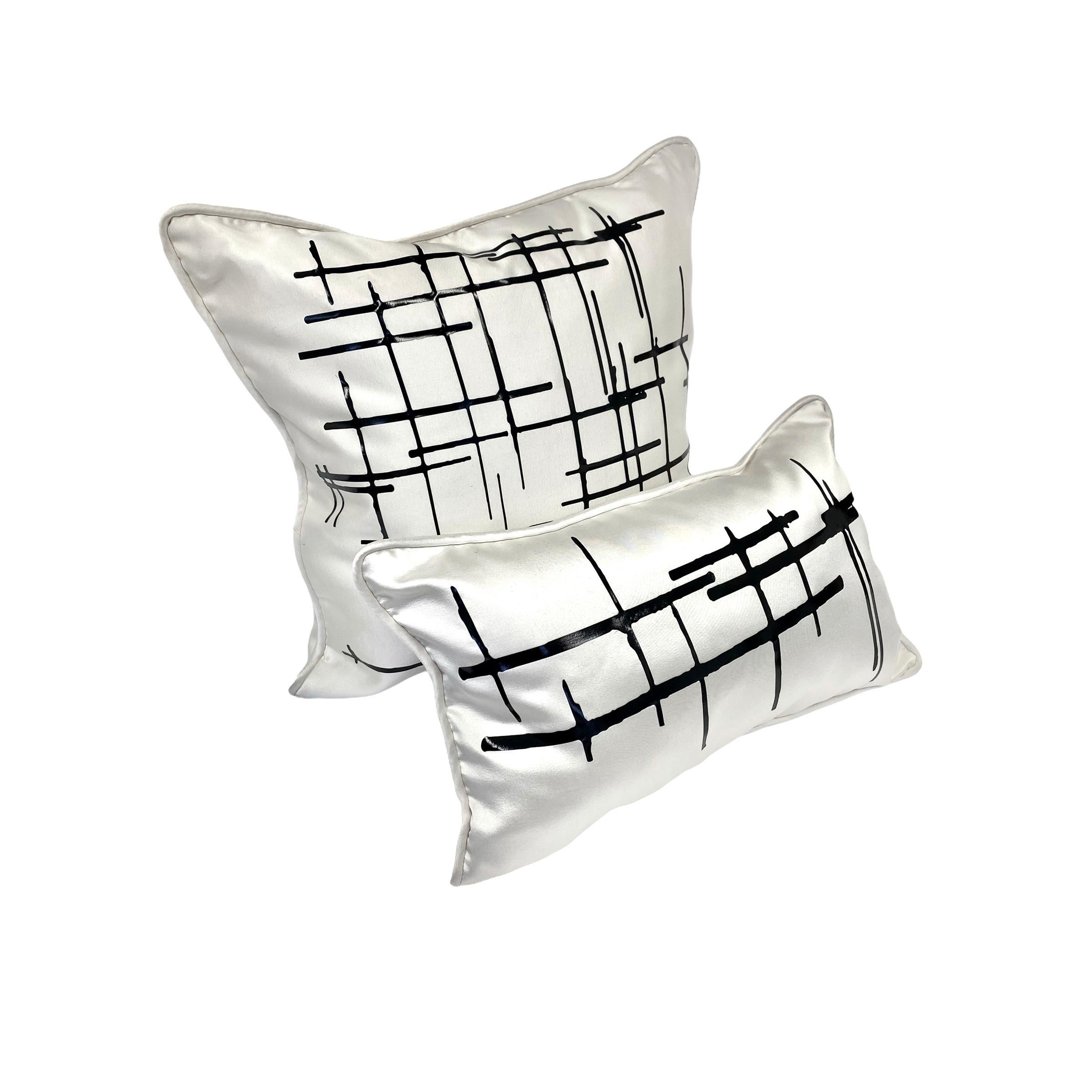 Authentic Italian silk wool in off-white. The luxury fabric is a blend of Italian virgin wool and silk, which makes for greater durability. This gives a perfect softness and sheen to the pillows, complementing any interior decor. The wool