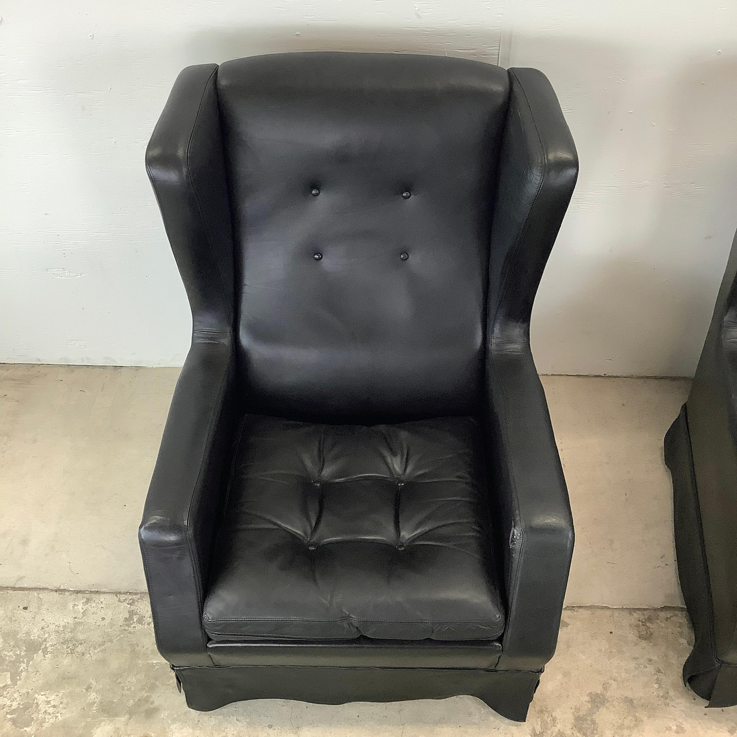 20th Century Pair Black Leather Wingback Armchairs With ottoman- Theo Ruth for artifort For Sale