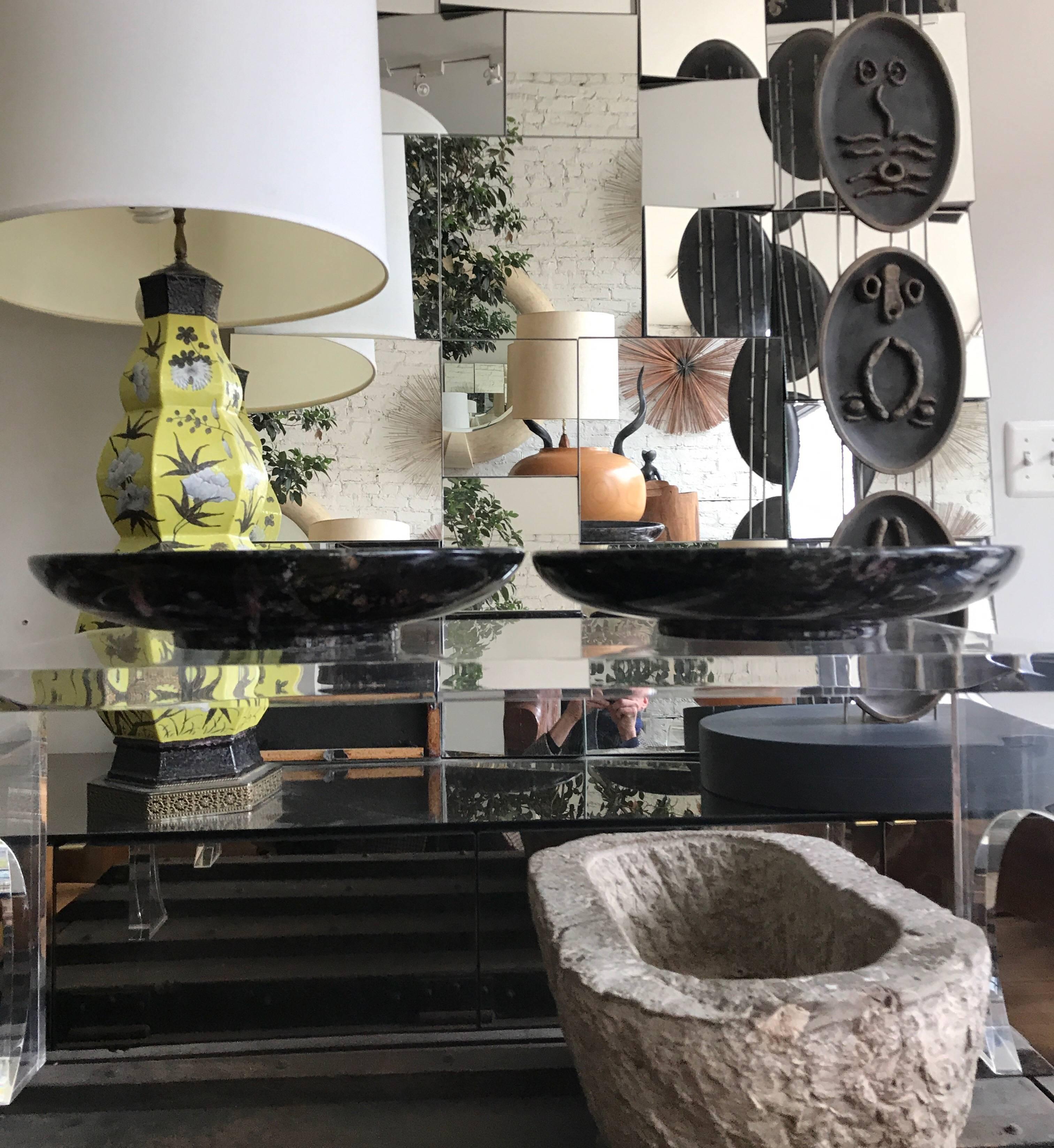An elegant pair of richly veined black Italian marble centrepiece bowls by Up & Up.
Wonderful Mid-Century Modern tabletop decorative object. The price is for the pair.
