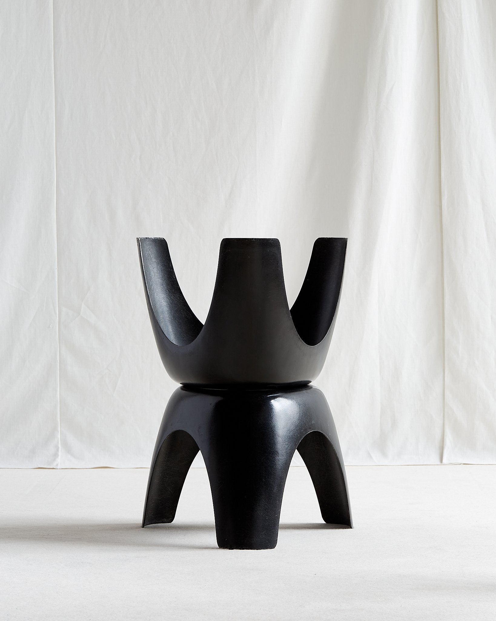 Pair of black Sori Yanagi Elephant Stools by Kotobuki, Japan c. 1950s.

Yanagi foil sticker on underside.

Originally designed by Yanagi as a work chair for his studio, the stool was released by Kotobuki a couple of years later after the company