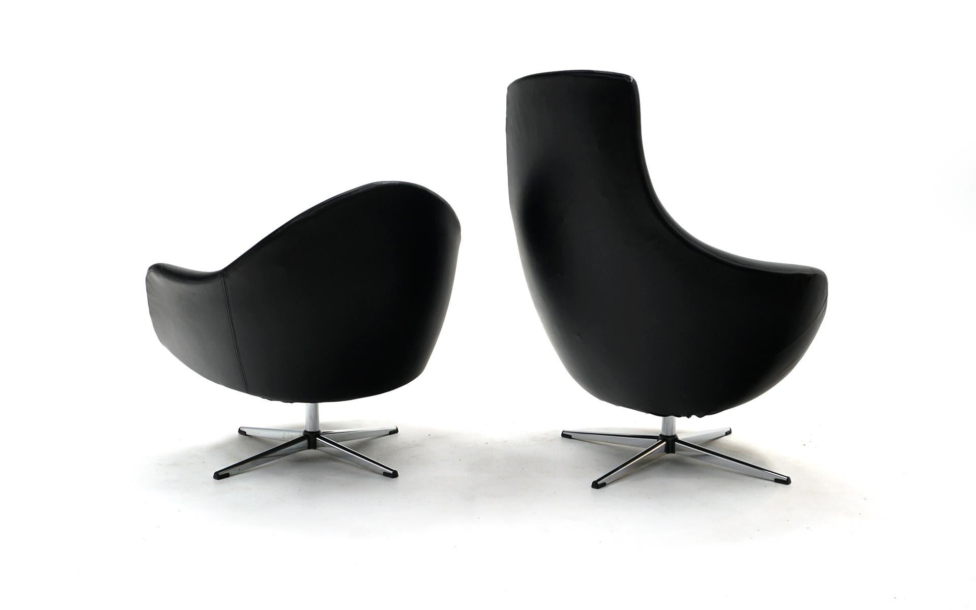 Mid-Century Modern Black Swivel Chairs by Overman, One High Back, One Standard, Ready to Use, Pair