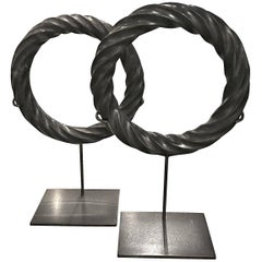 Pair of Black Twisted Marble Ring Sculptures on Stands, China, Contemporary