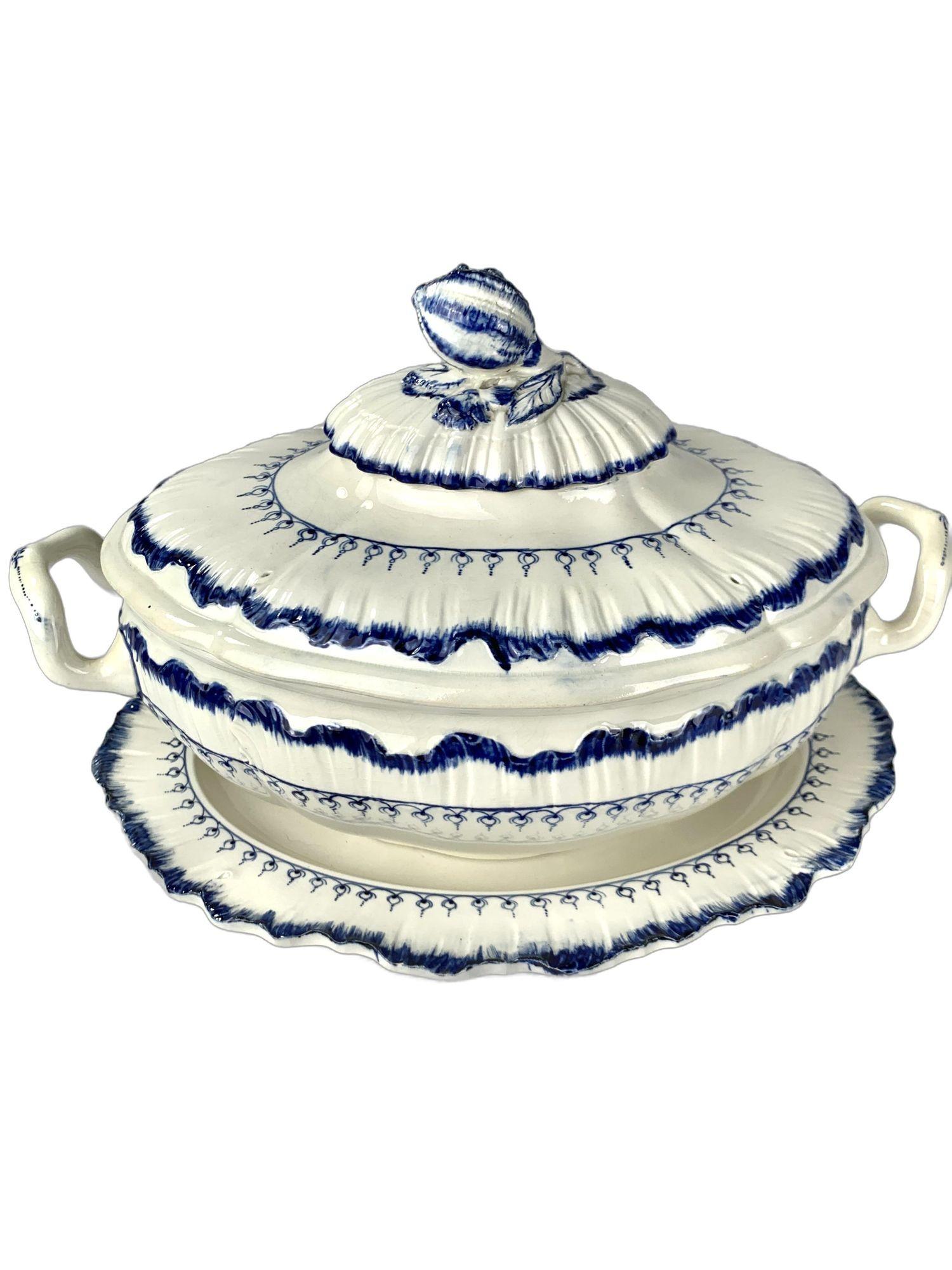 This exquisite pair of Wedgwood blue and white Mared pattern soup tureens was made in England circa 1840.
The design features a loop of delicate 