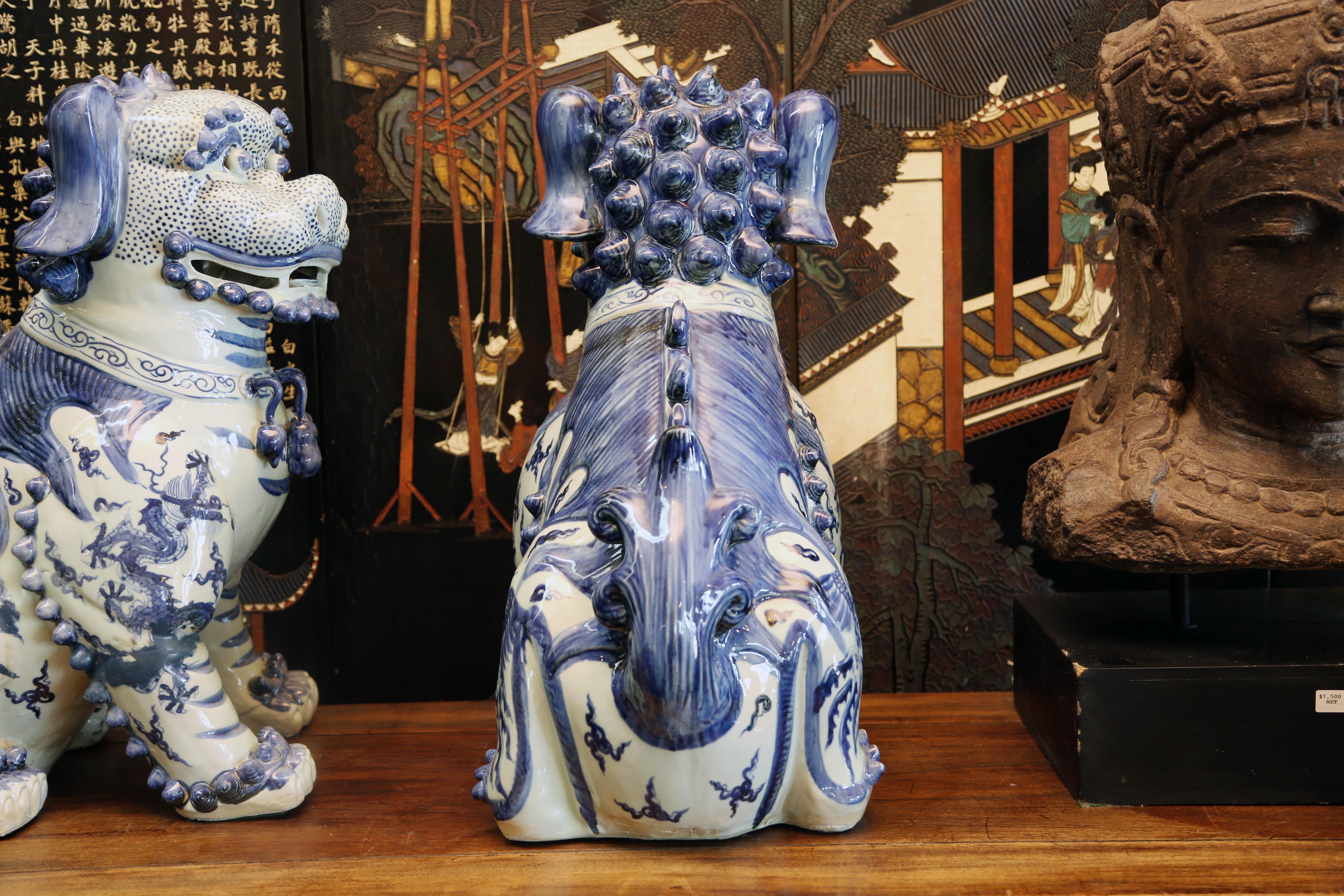 Asian Pair Blue and White Chinese Foo Dogs Hand-Painted, Private Chinese Collection For Sale
