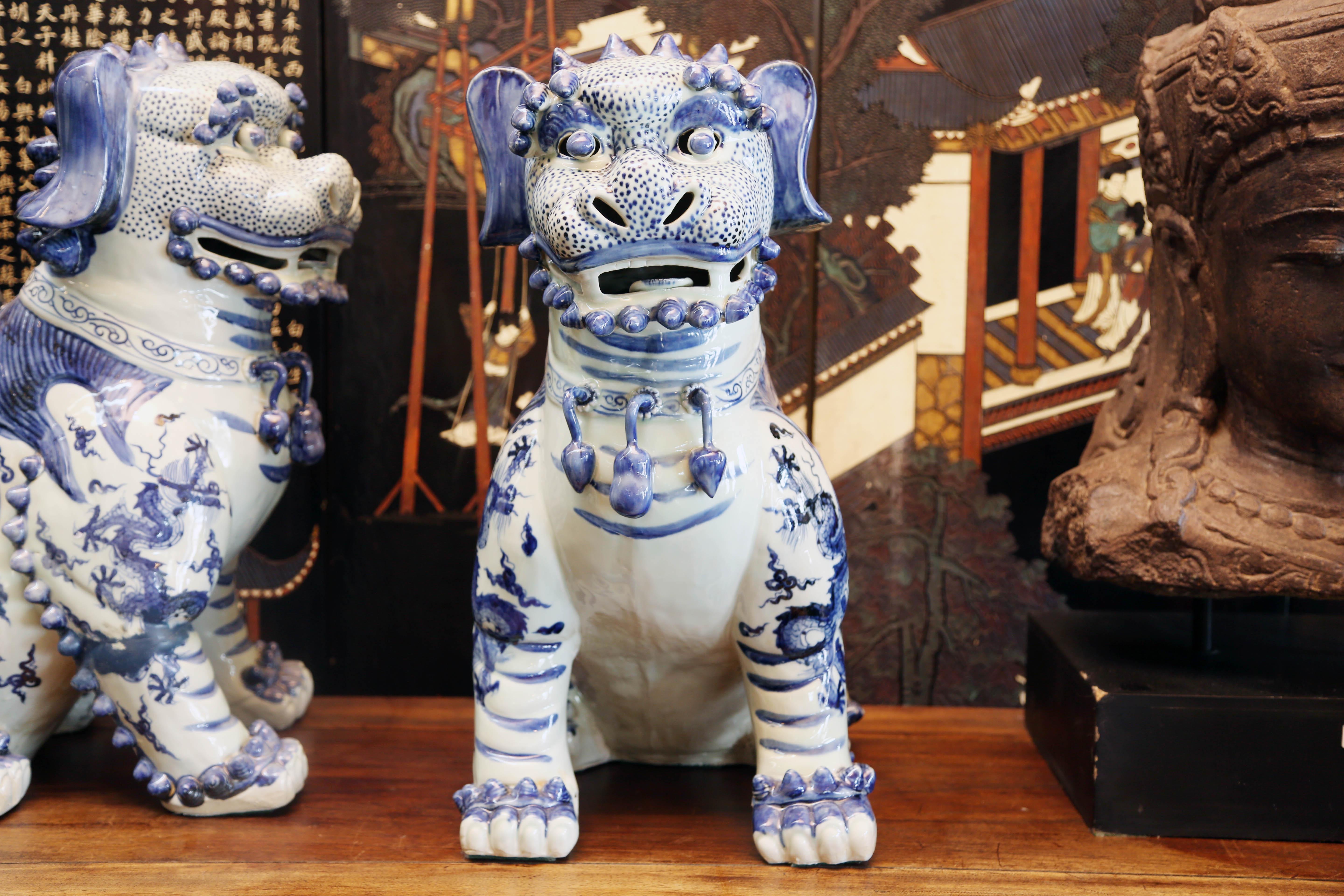 Porcelain Pair Blue and White Chinese Foo Dogs Hand-Painted, Private Chinese Collection For Sale