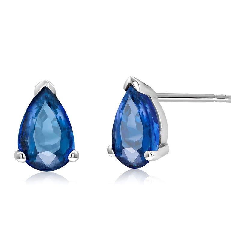 Women's or Men's Pair Blue Pear Shape Sapphire White Gold Stud Earrings Weighing 1.45 Carats For Sale