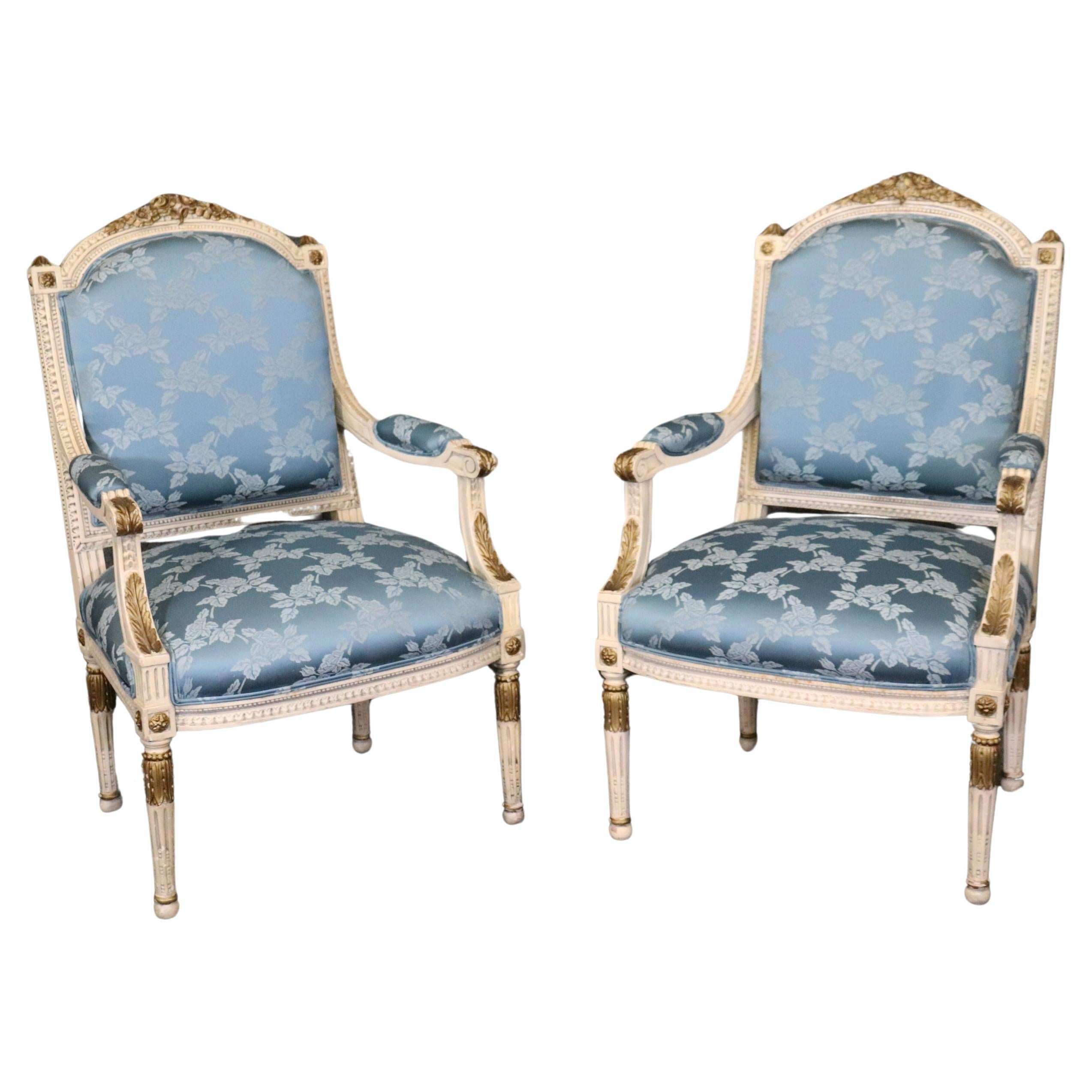 Pair Blue Silk Upholstered French Painted and Gilded louis XVI Style Armchairs
