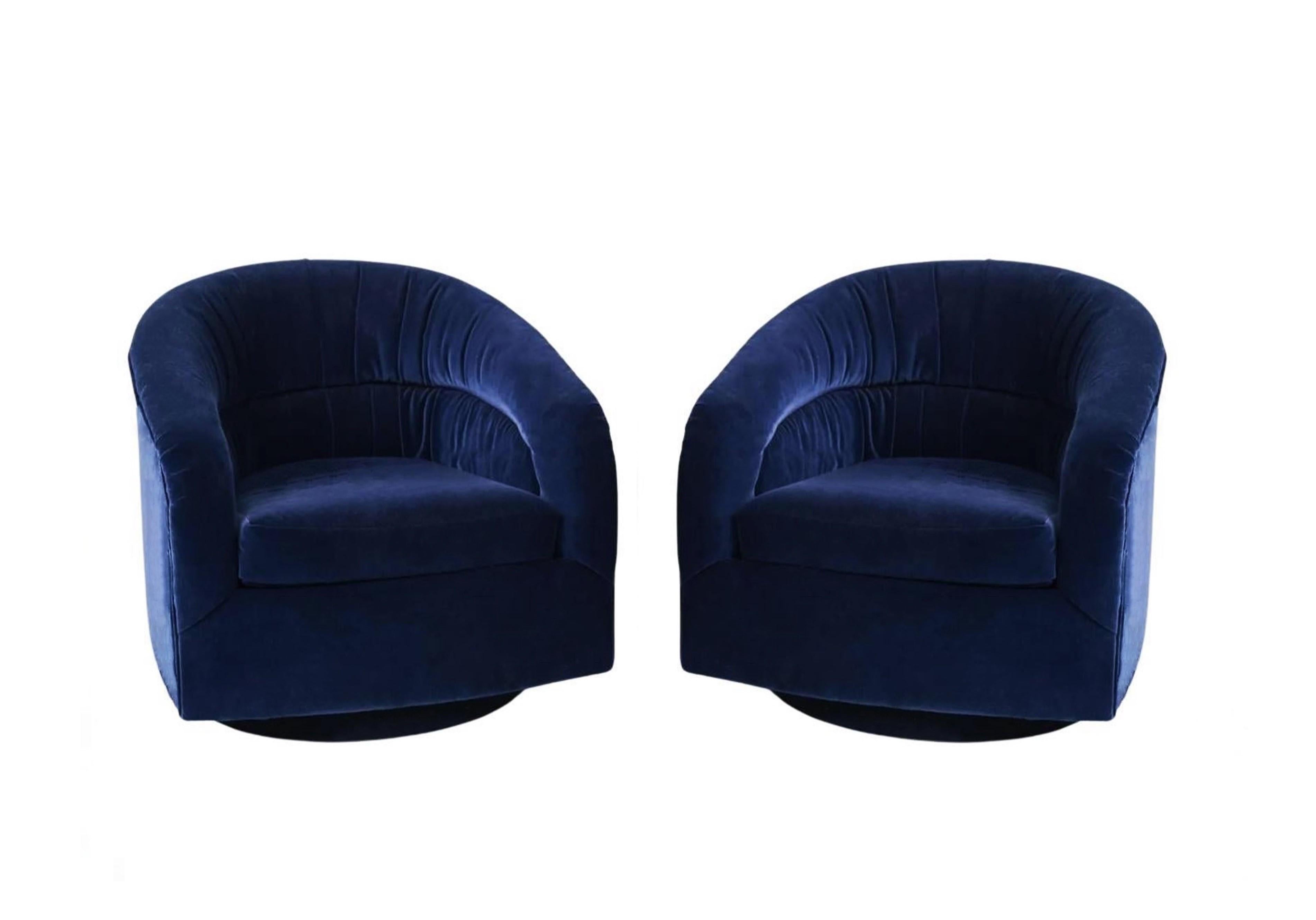 These plush chairs are so much more than just typical swivel chairs, draws influence from Milo Baughman, the perfect representation of a classically current design. These accommodating barrel chairs with rounded backs that encapsulates your body to