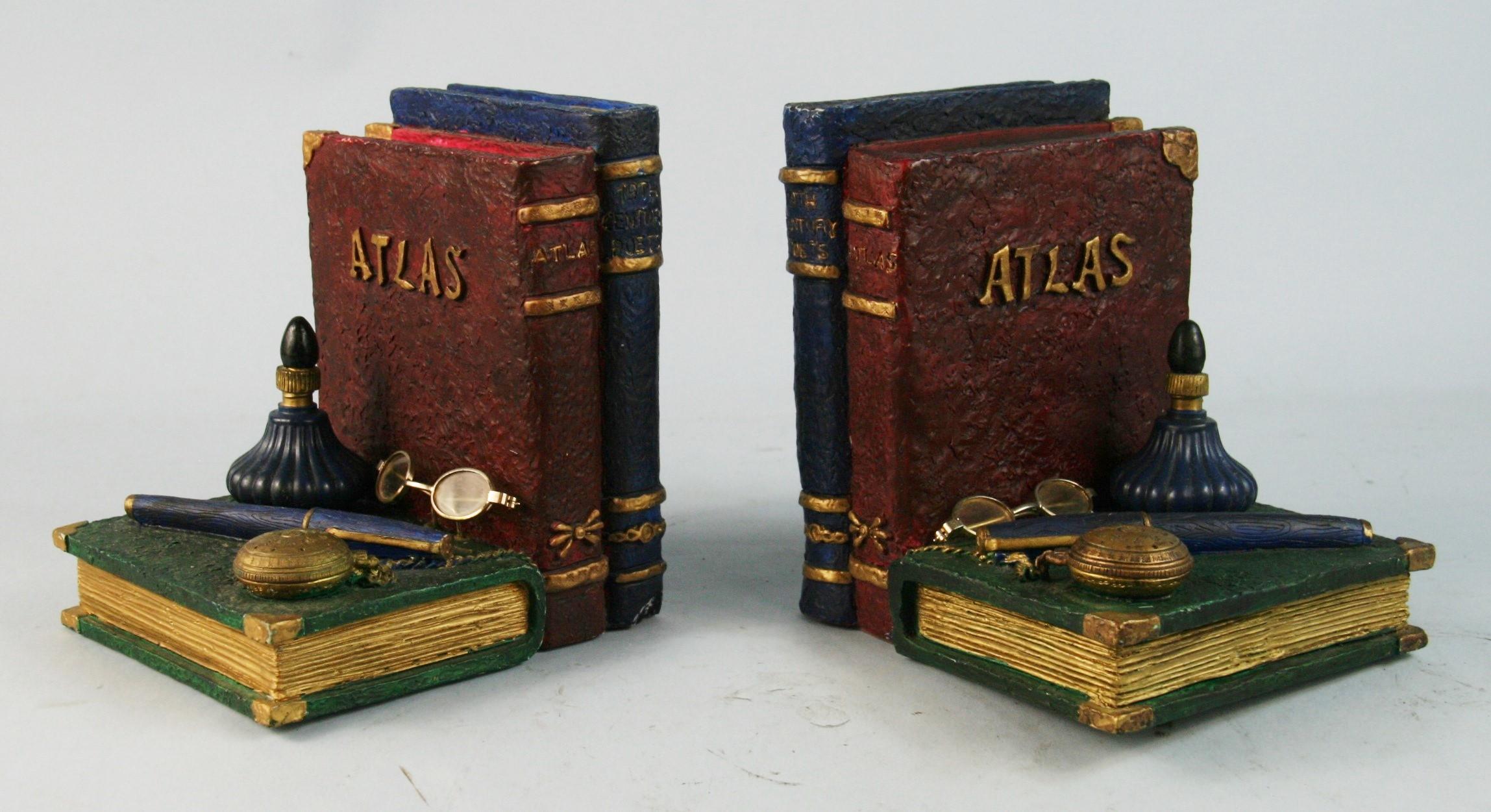 3-768 Pair bookends with pen,books,inkwell and spectical.