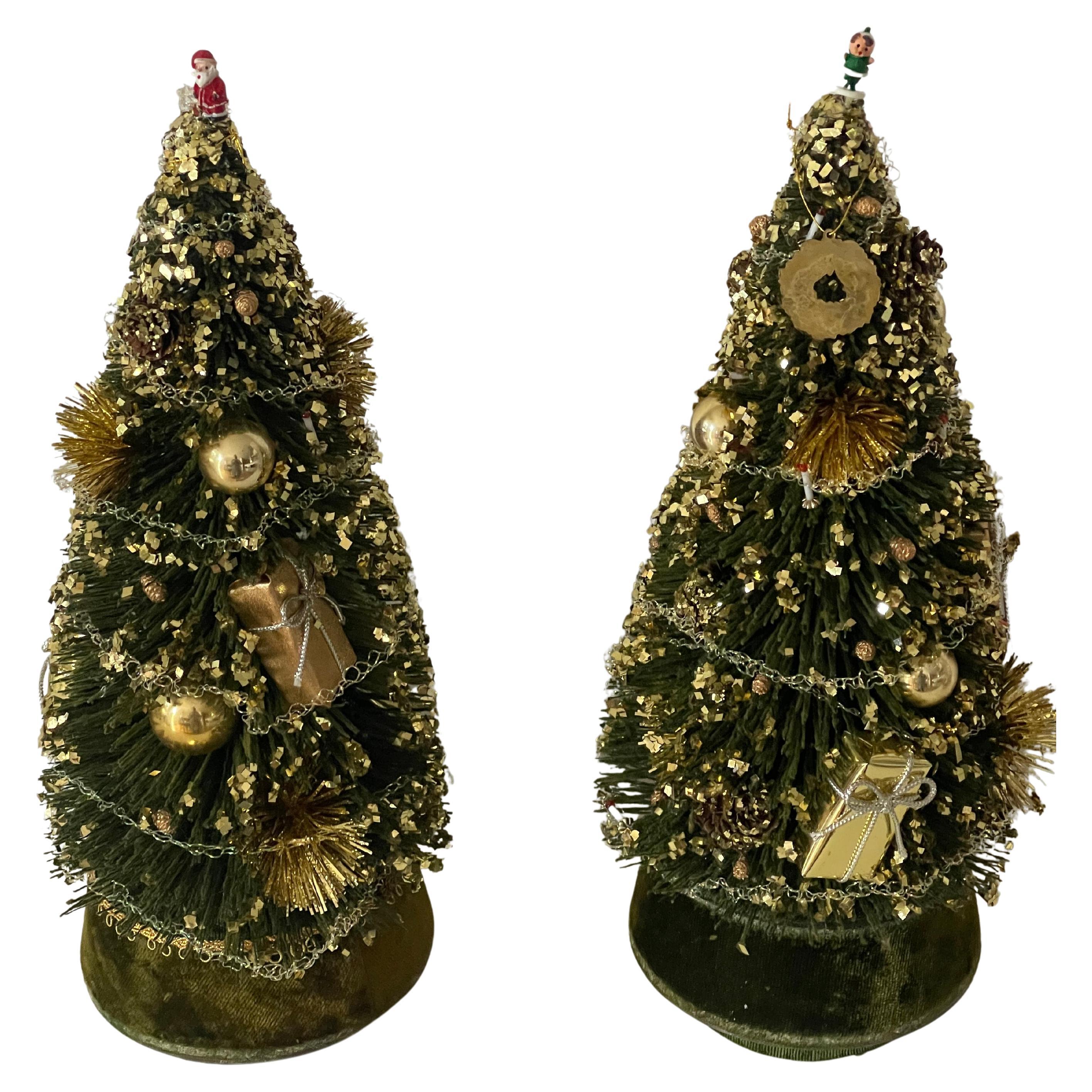 Abbina gli alberi di Natale di Bottlebrush con Mudic e Movimento