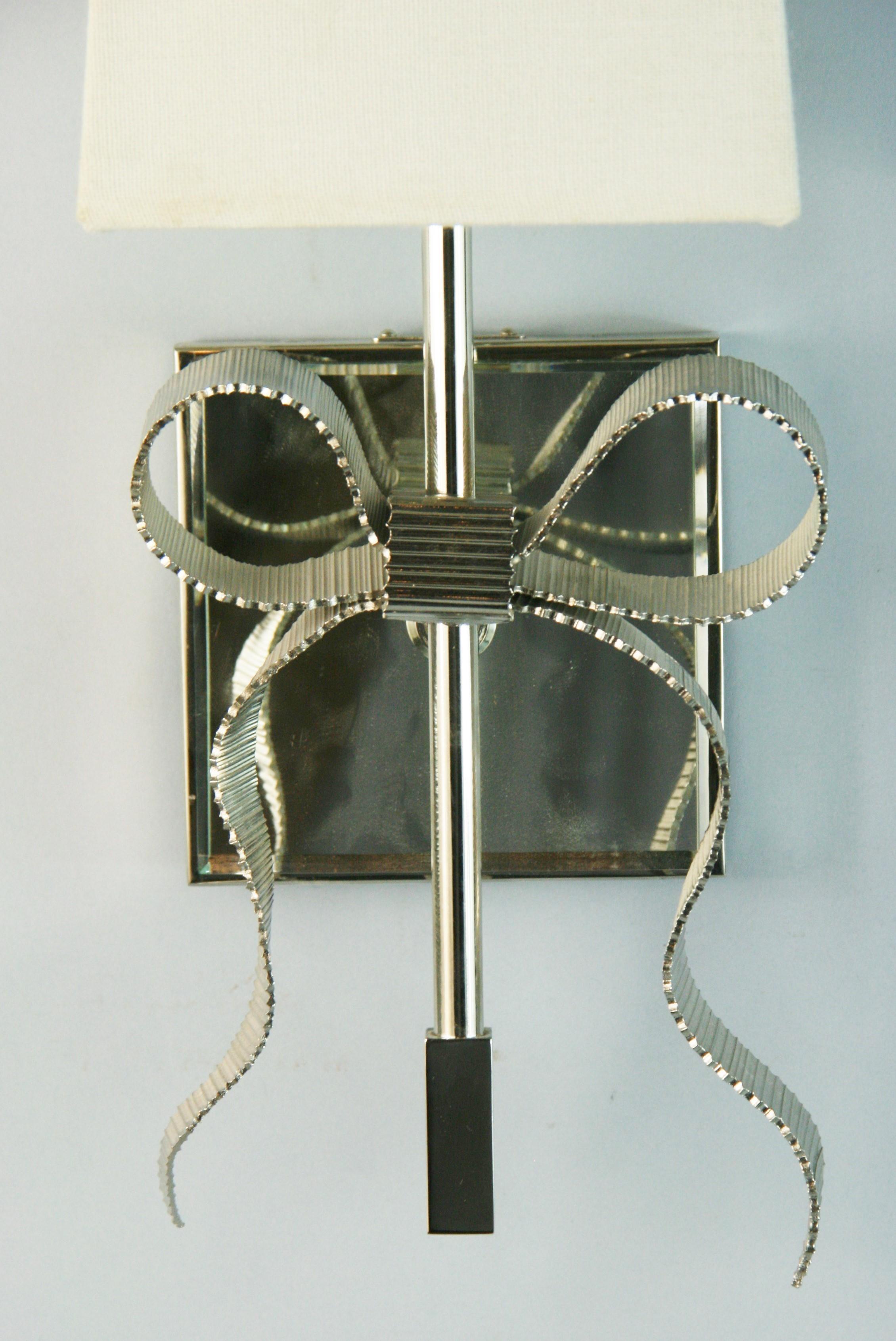 Pair Bowe Mirrored back sconces Designed By Kate Spade for Intertek Circa  2012 In Good Condition For Sale In Douglas Manor, NY
