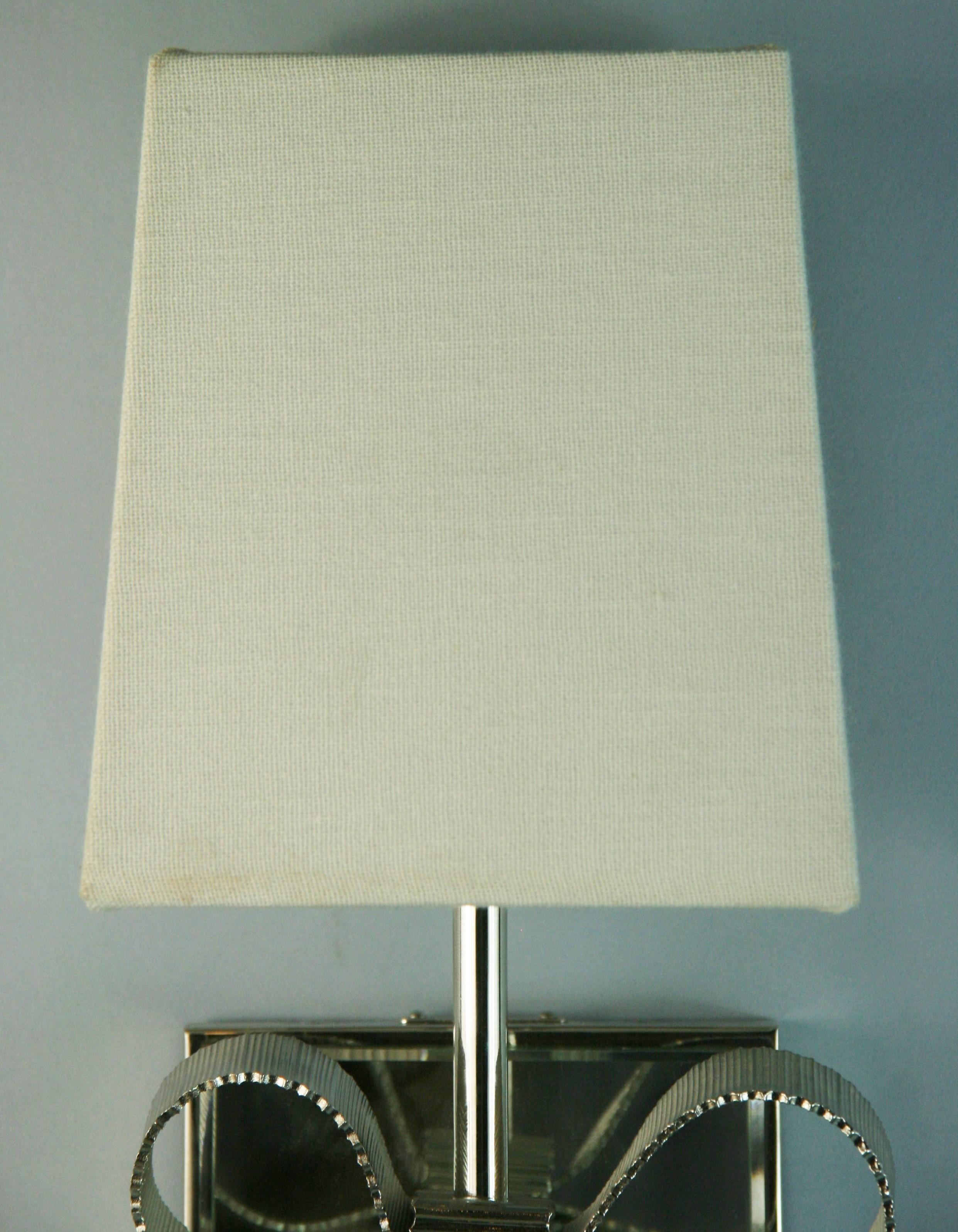 Contemporary Pair Bowe Mirrored back sconces Designed By Kate Spade for Intertek Circa  2012 For Sale
