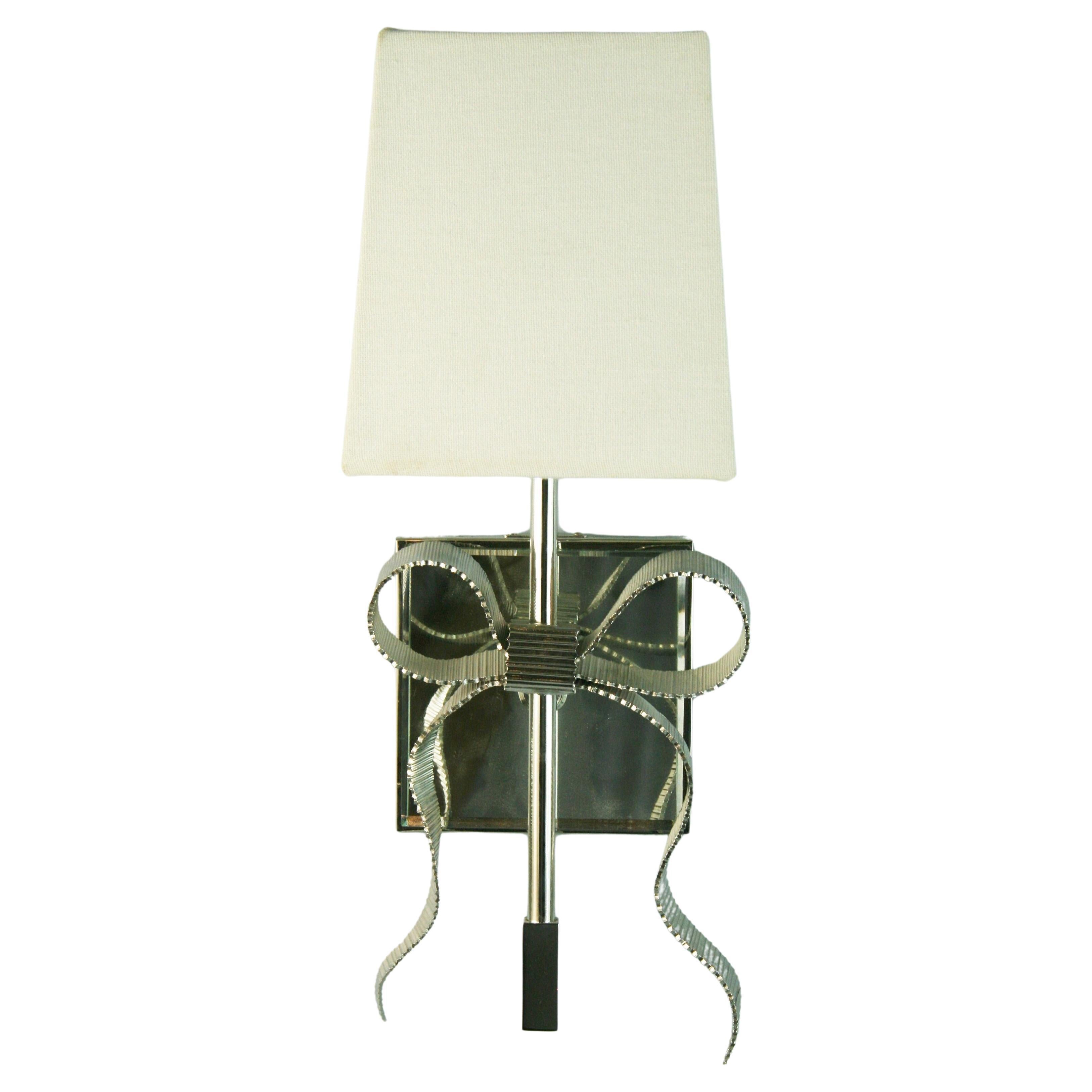Pair Bowe Mirrored back sconces Designed By Kate Spade for Intertek Circa  2012 For Sale