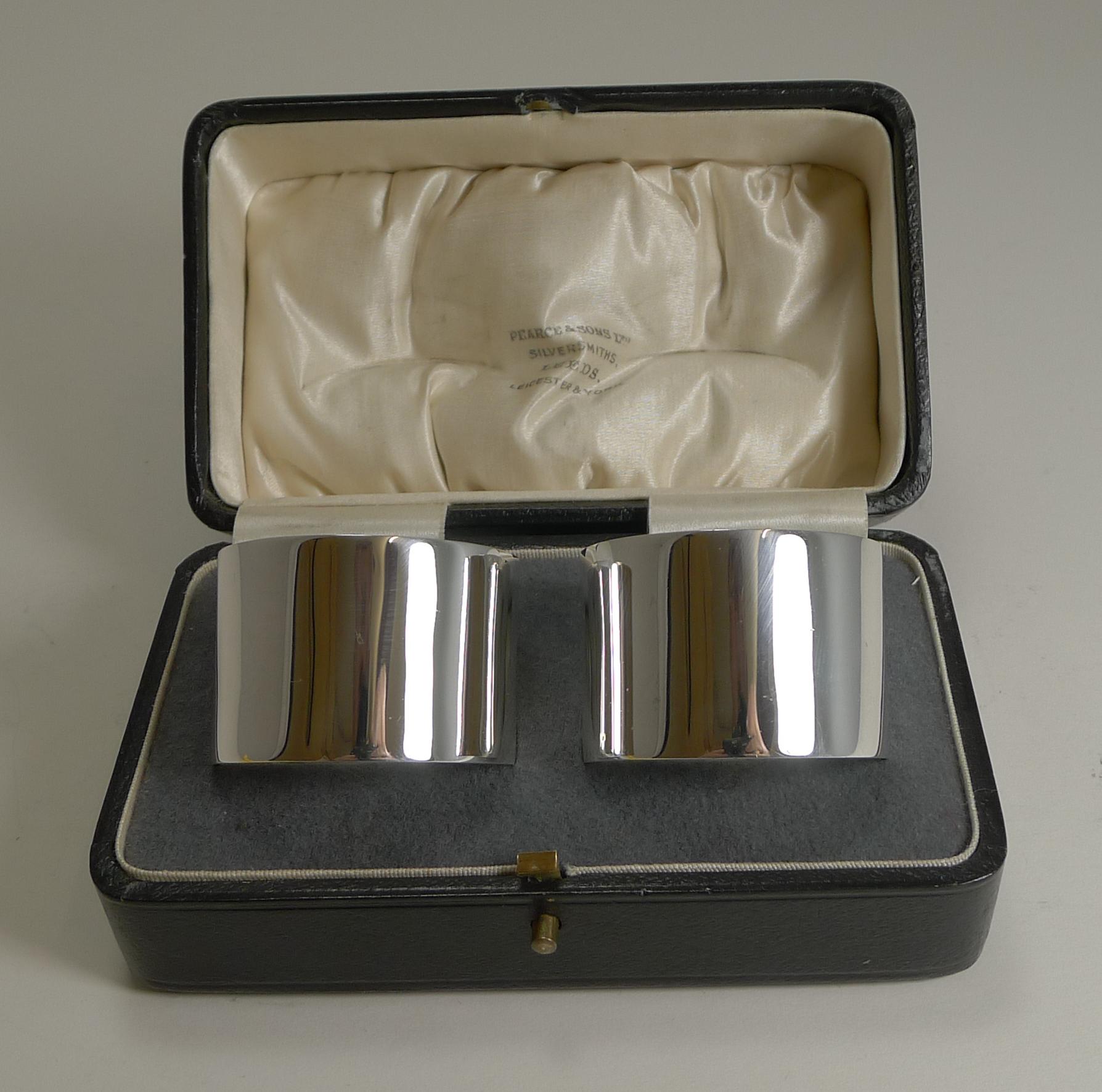 A very smart and elegant pair of English sterling silver napkin rings, perfect if you are looking for something simple or with a more contemporary design.

95 years old and fully hallmarked with the highly collectable Chester assay office and the